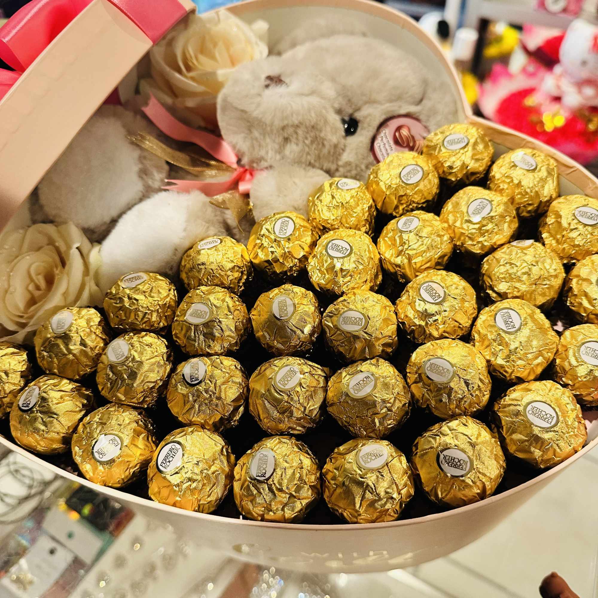 Beautiful Ferrero Rocher chocolate box and chocolate bear with chocolate scent, ideal