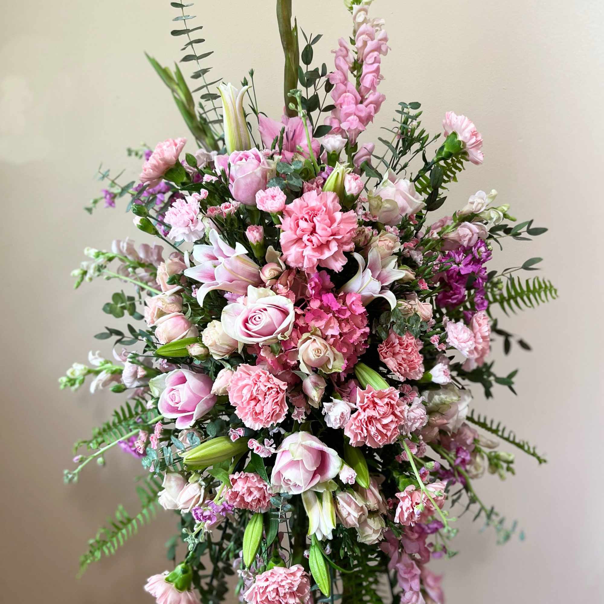 Take a walk through the garden of memories with this lush spray