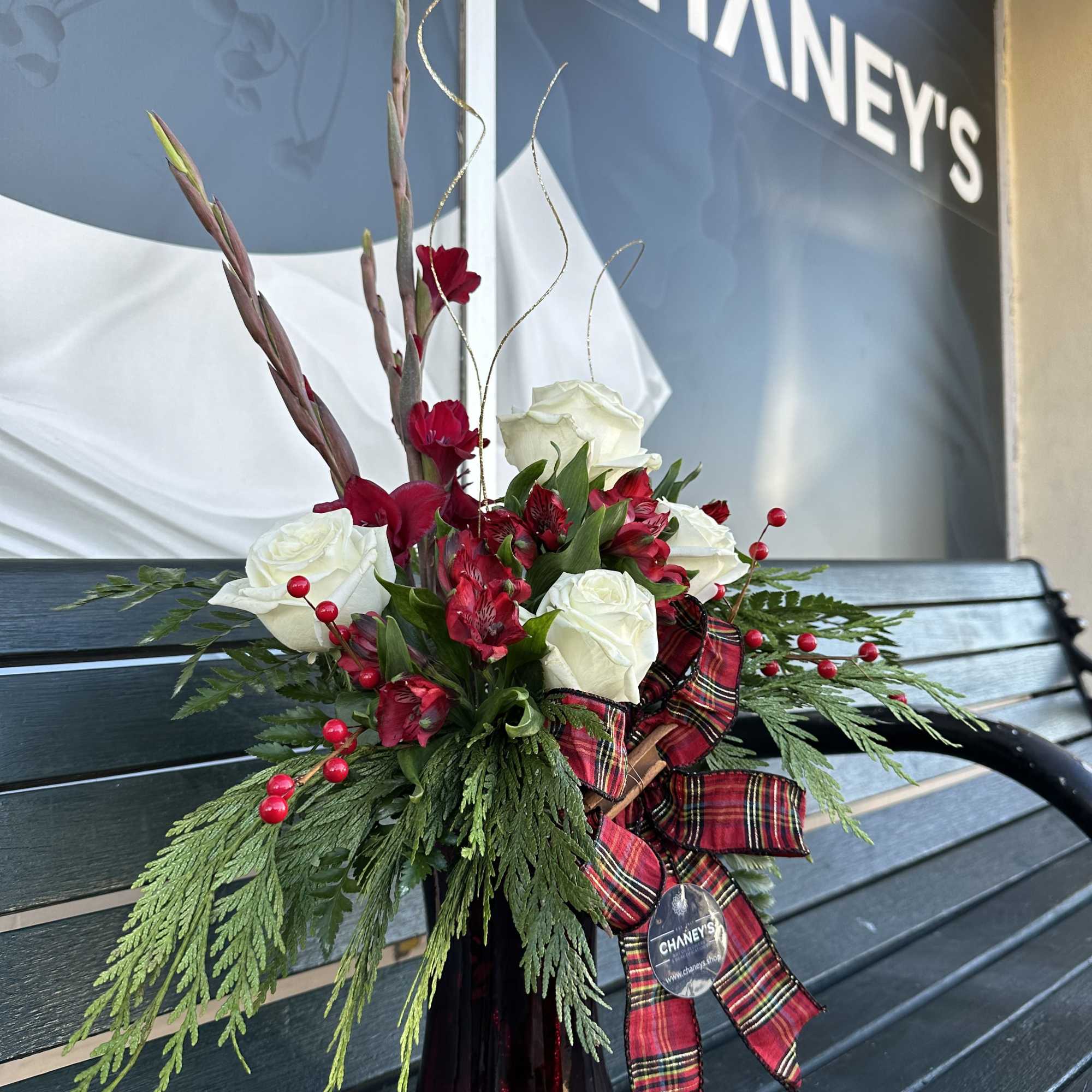 Grand floral fresh cut Christmas design in red white green and gold.