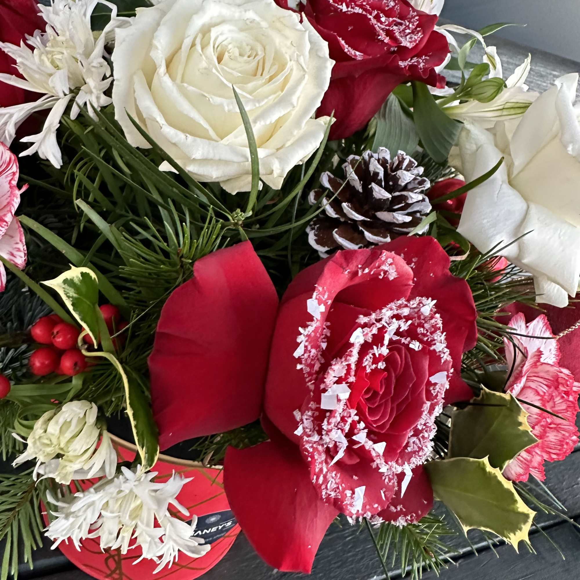Beautiful Centerpiece in a solid metal container. 