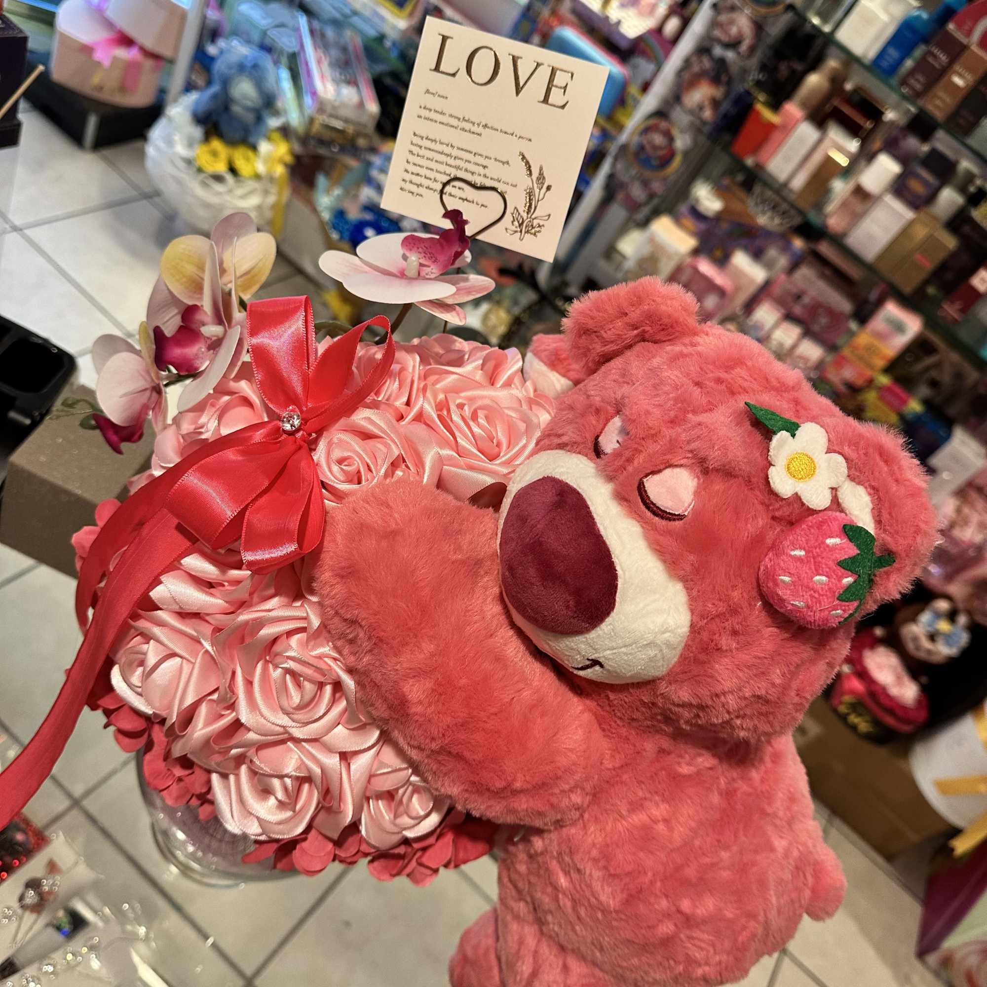 Beautiful vase with eternal roses of ribbon with a beautiful stuffed animal Beautiful vase with eternal roses of ribbon with a beautiful stuffed animal