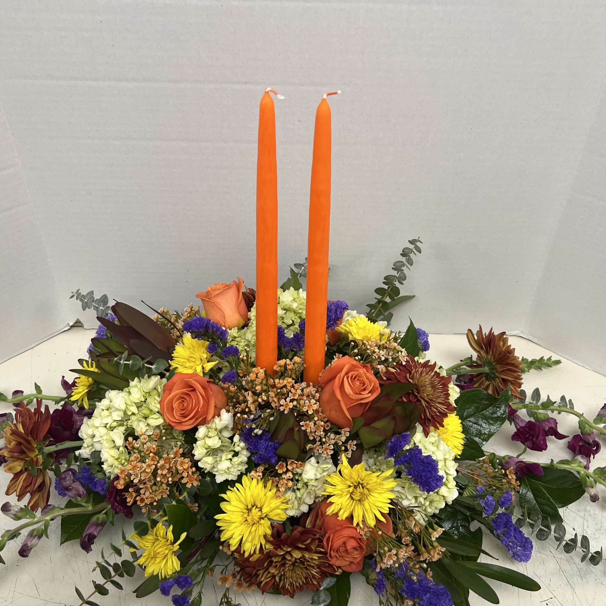 Fall centerpiece in a low dish with candles. Perfect for thanksgiving!! Fall centerpiece in a low dish with candles. Perfect for thanksgiving!!