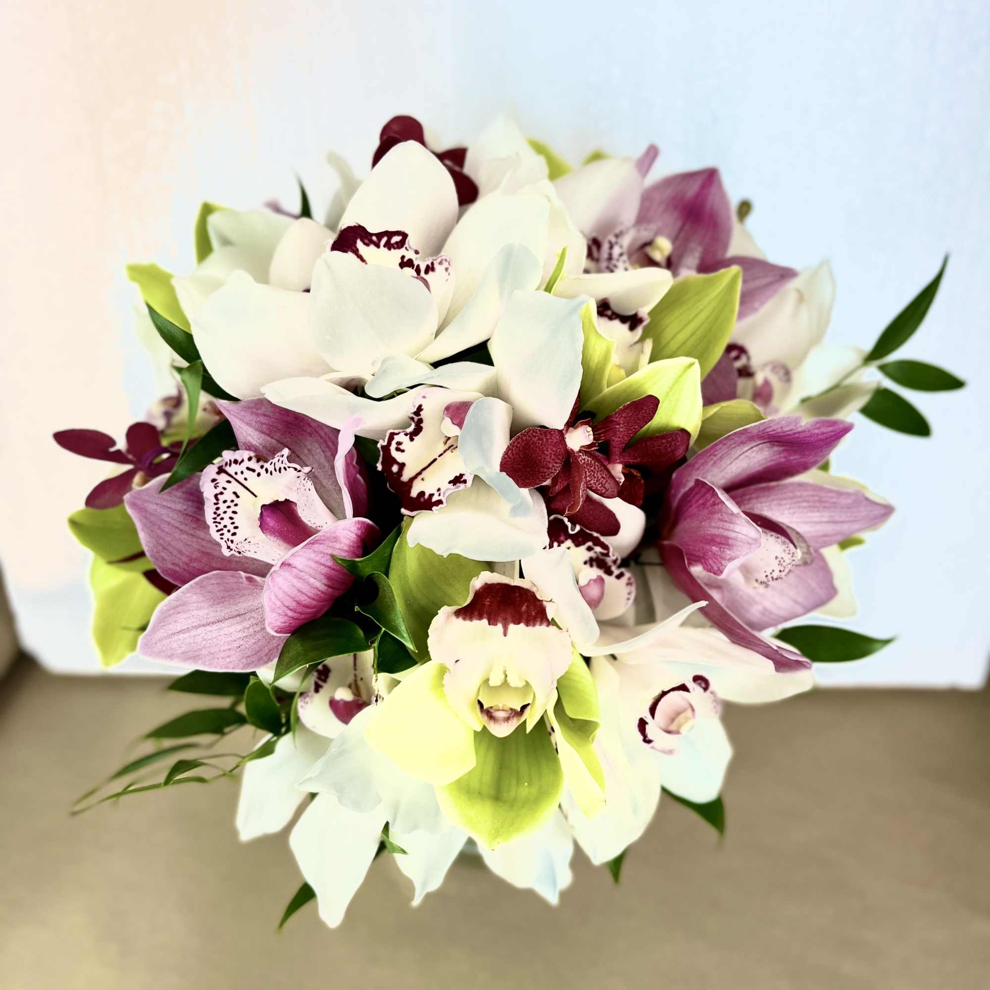 Beautiful 10&quot; Tropical Bridal Bouquet consisting of Cymbidium and Makara Orchids and