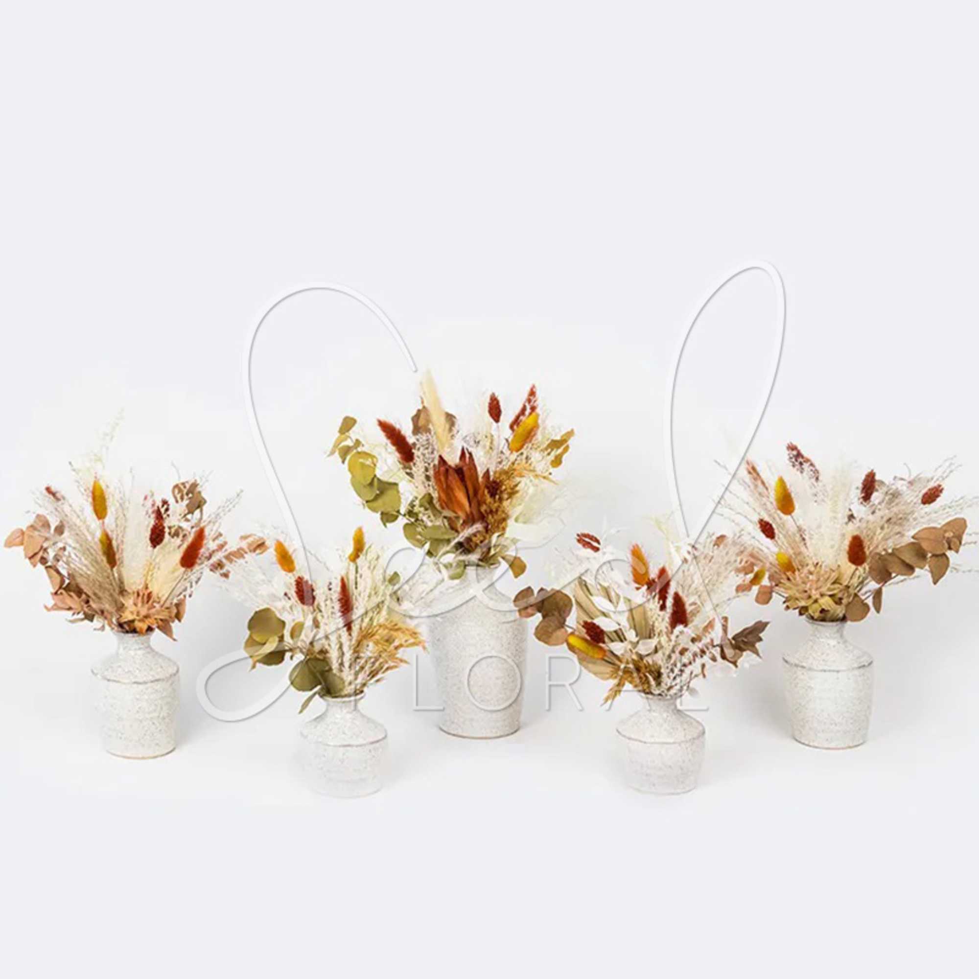 Enjoy this festive set of autumnal preserved blooms arranged in assorted Hari