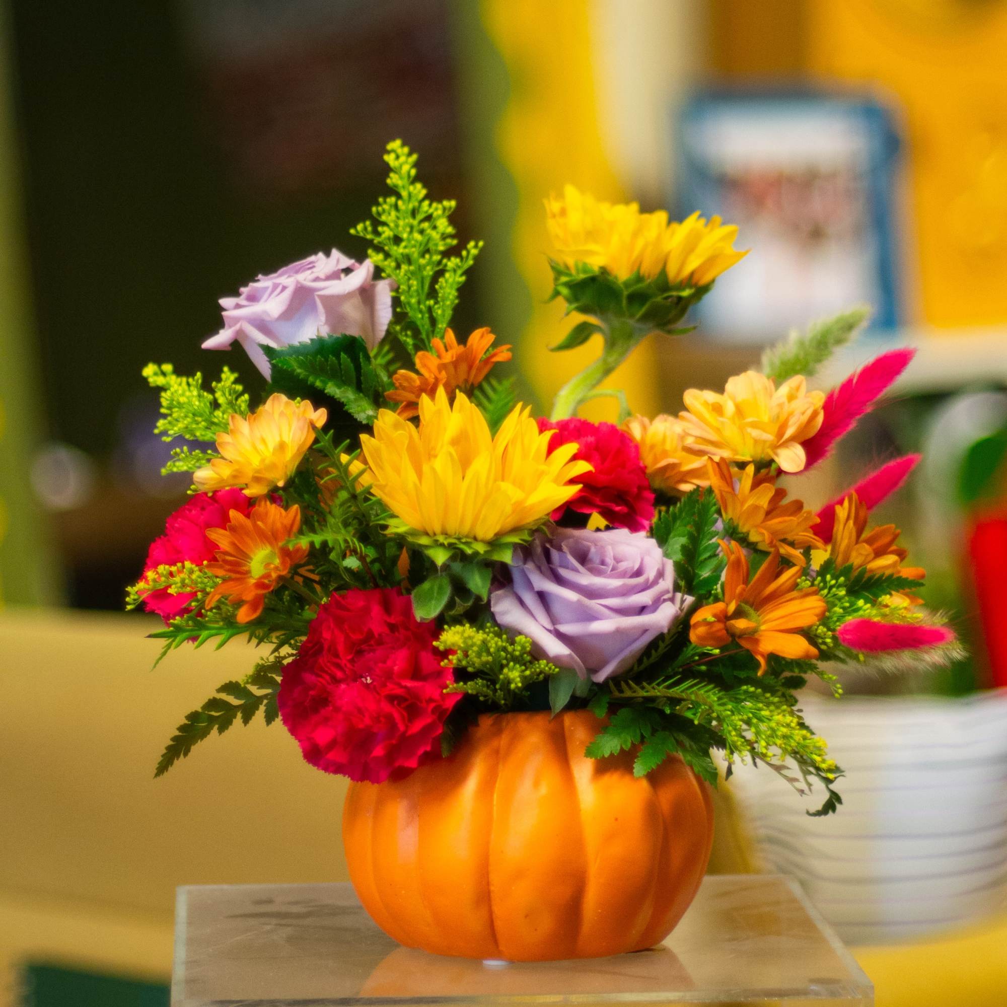 The flowers and dried accents are designer&#039;s choice, left in the hands