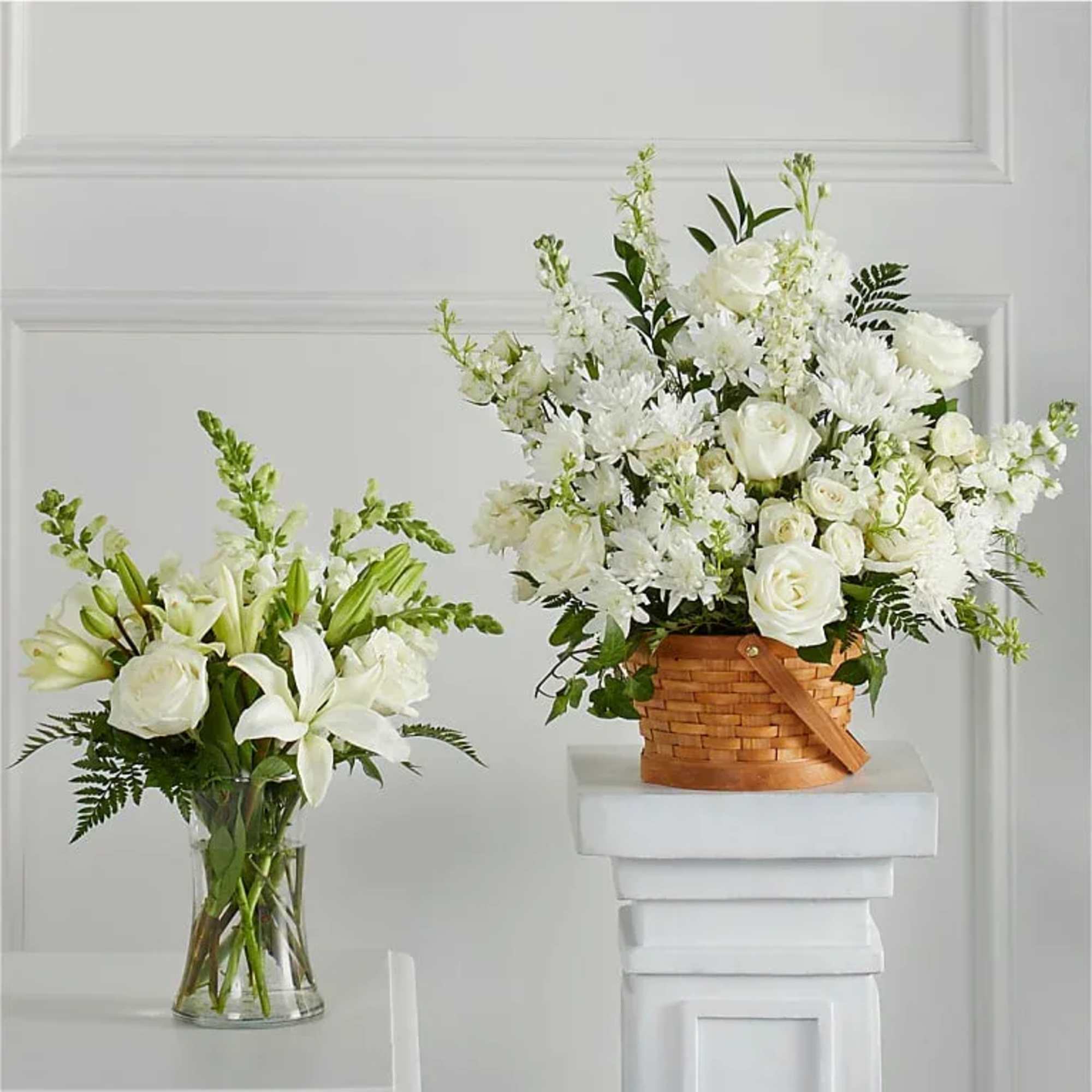 A refined collection of all-white sympathy arrangements designed to express peace, respect A refined collection of all-white sympathy arrangements designed to express peace, respect