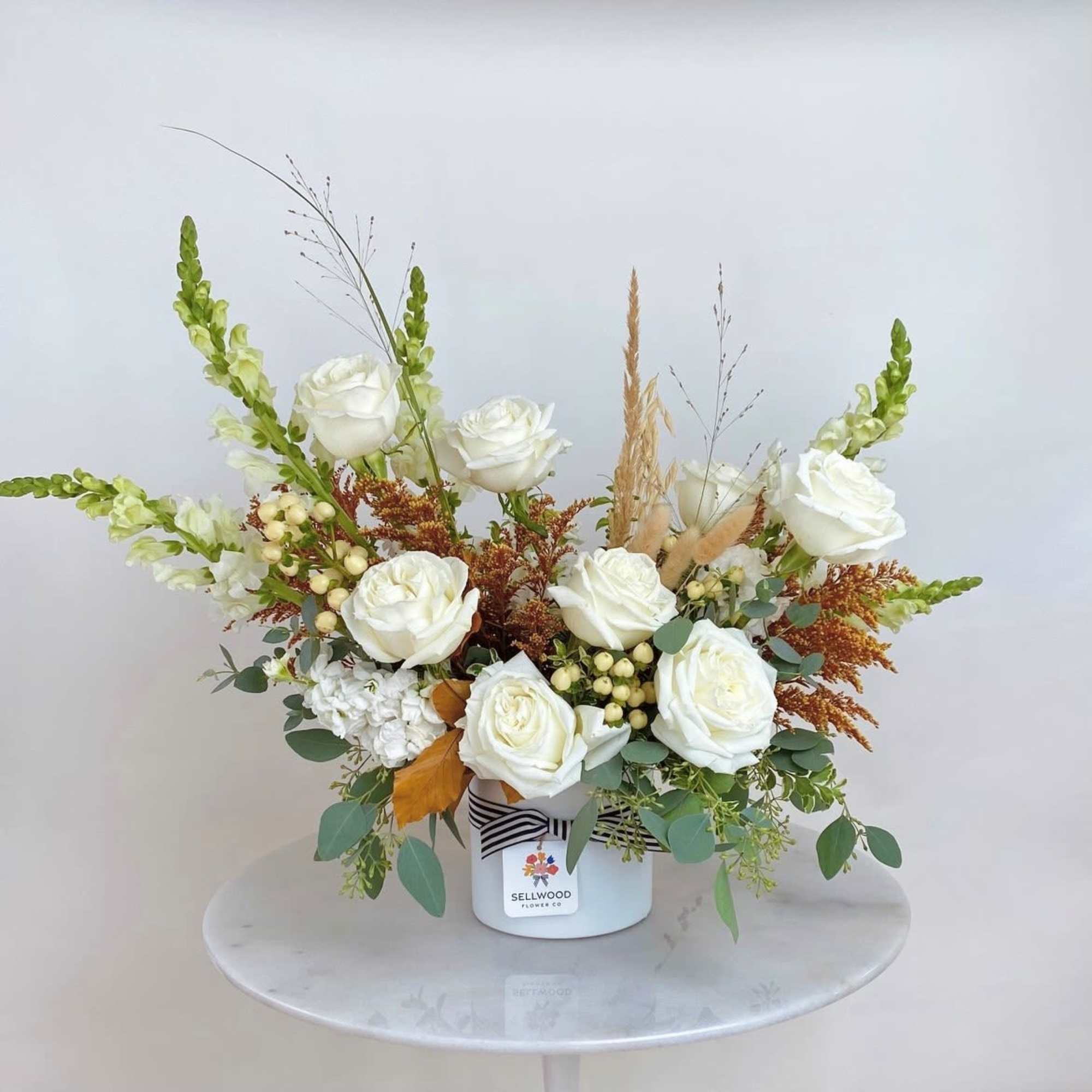 Beautiful and simply elegant arrangement of all white blooms. 