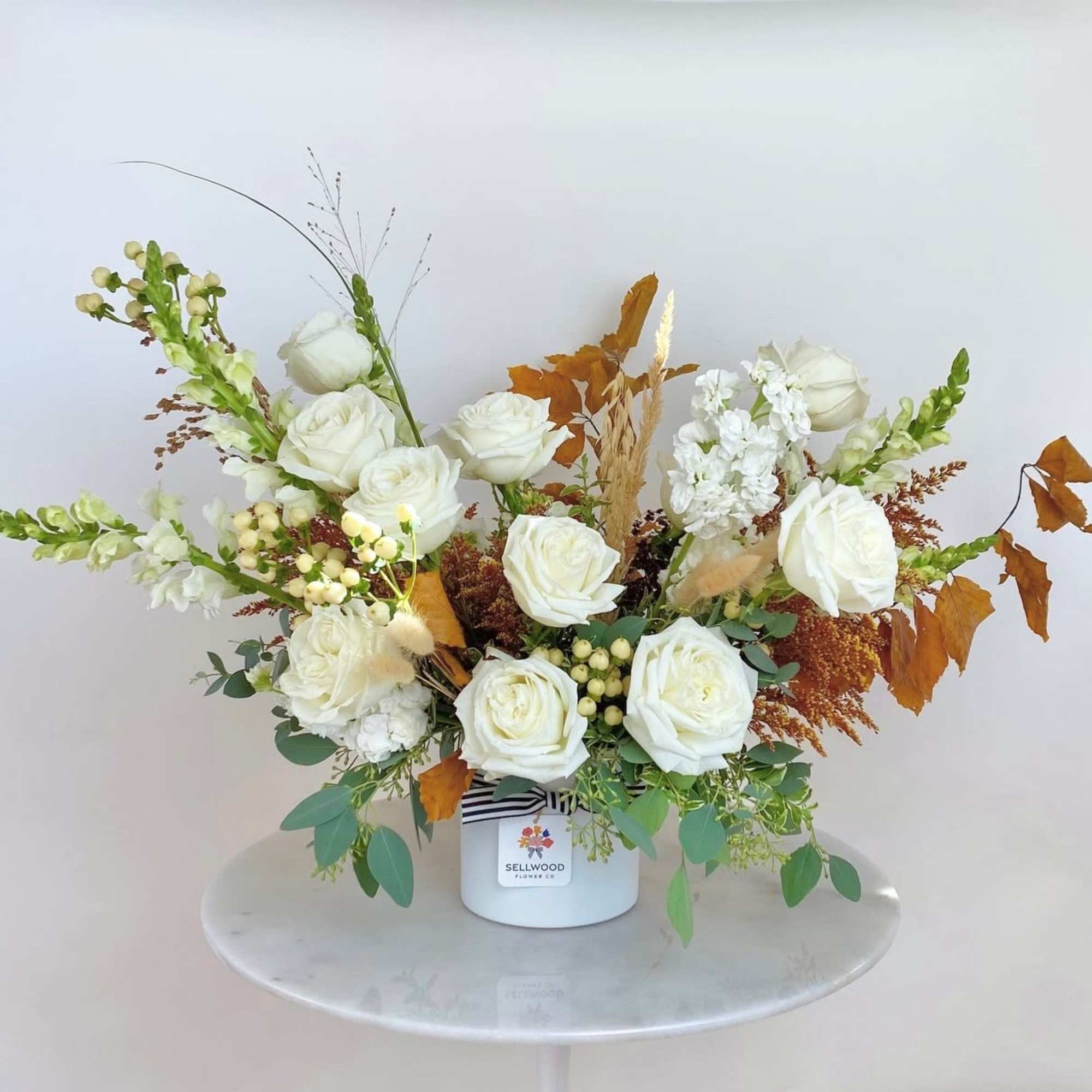 Beautiful and simply elegant arrangement of all white blooms. 