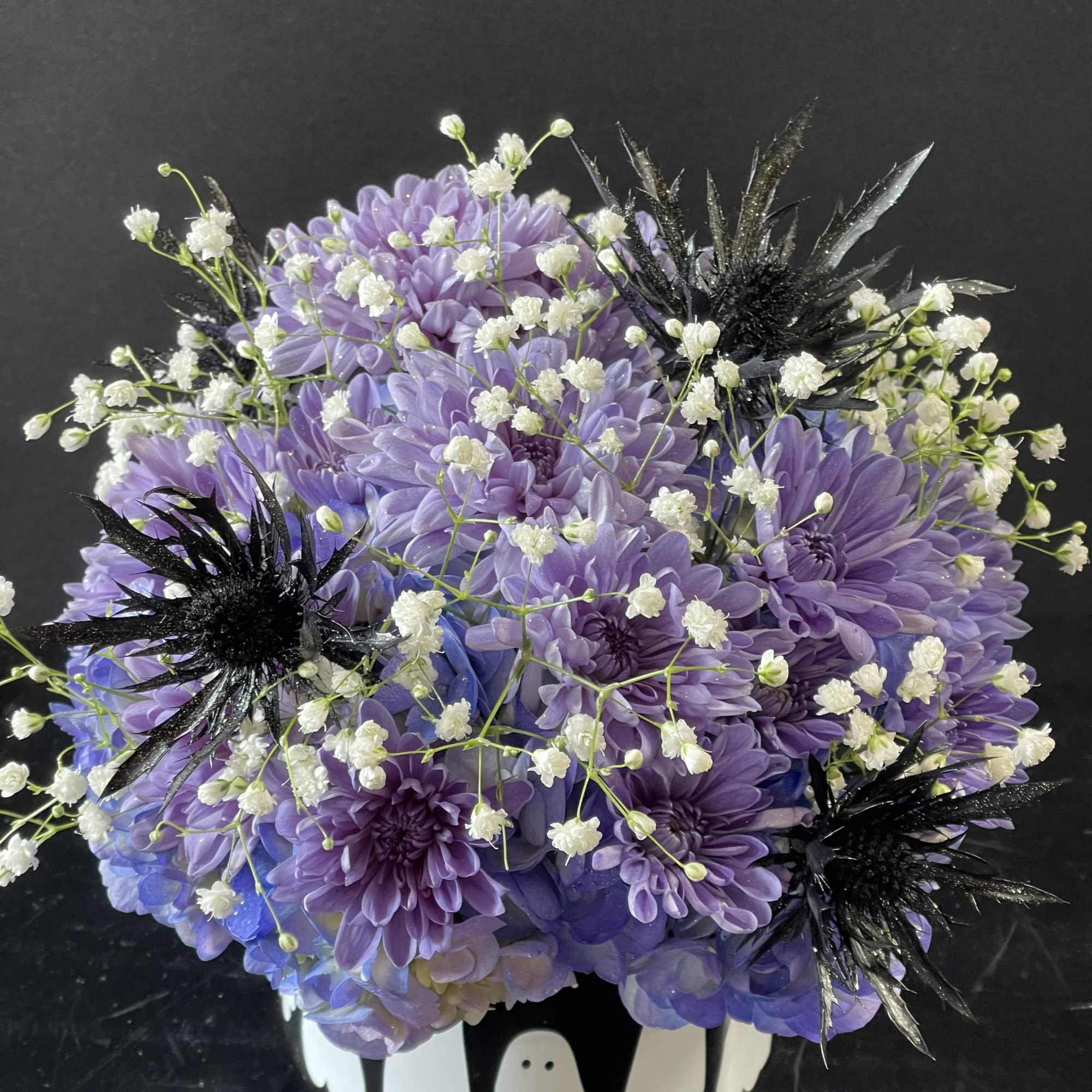 A cute and spooky arrangement meant to look like a starry night A cute and spooky arrangement meant to look like a starry night