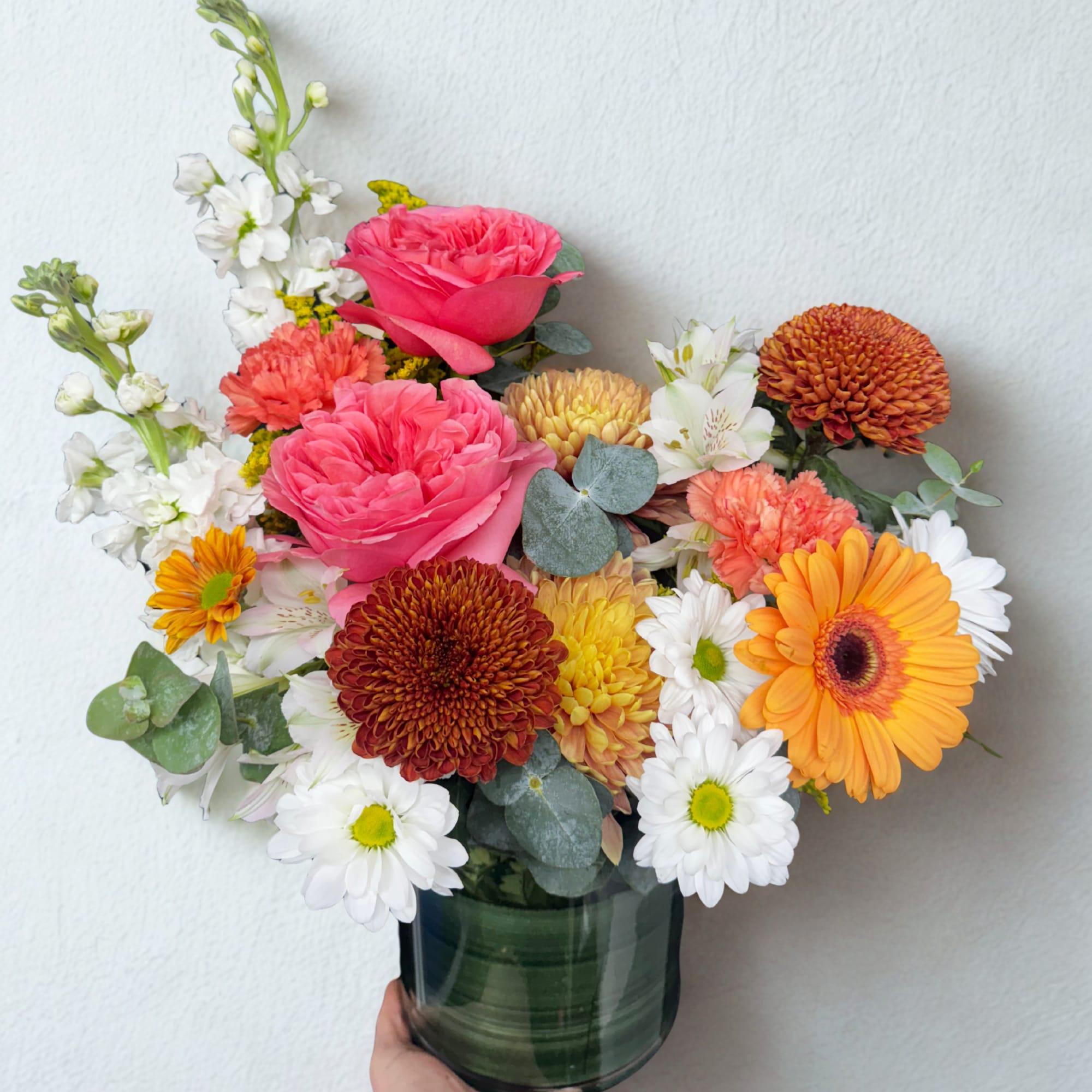 A radiant mix that feels like golden hour in a vase. featuring
