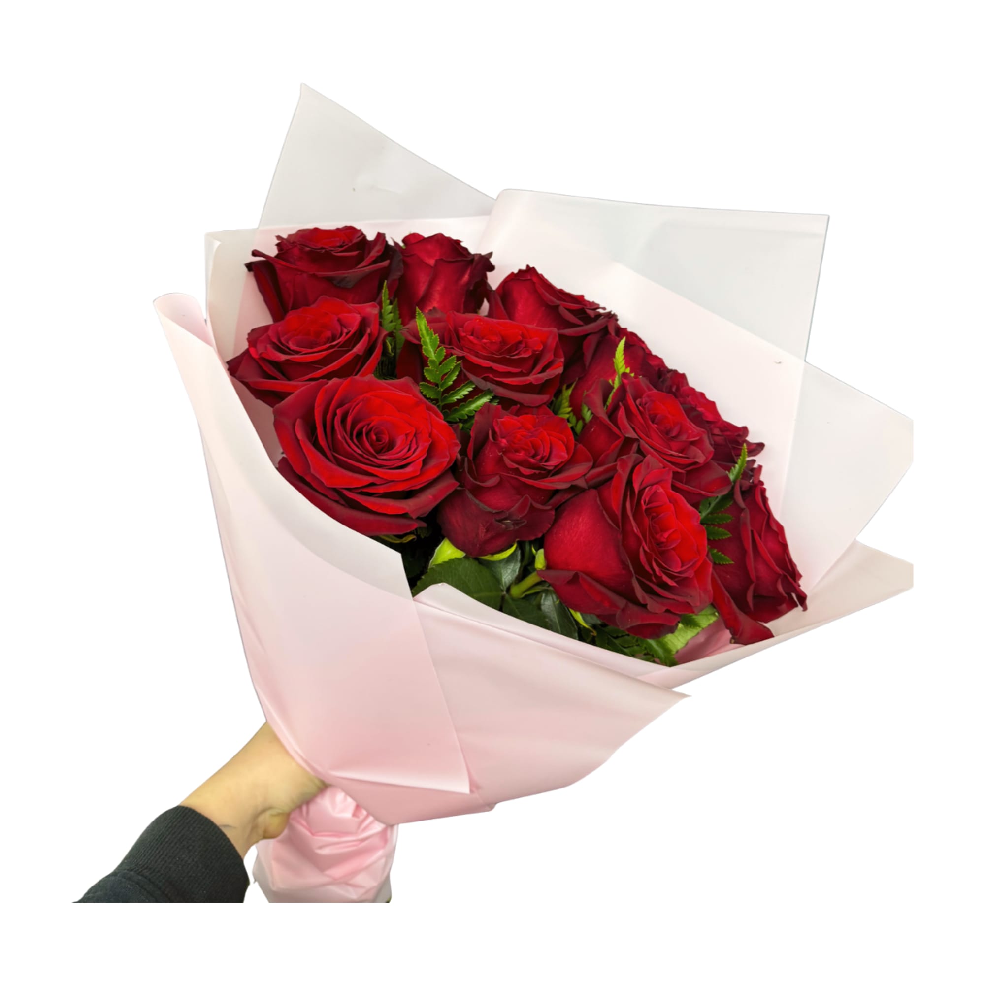 A timeless bouquet of 12 velvety red roses, wrapped in soft blush