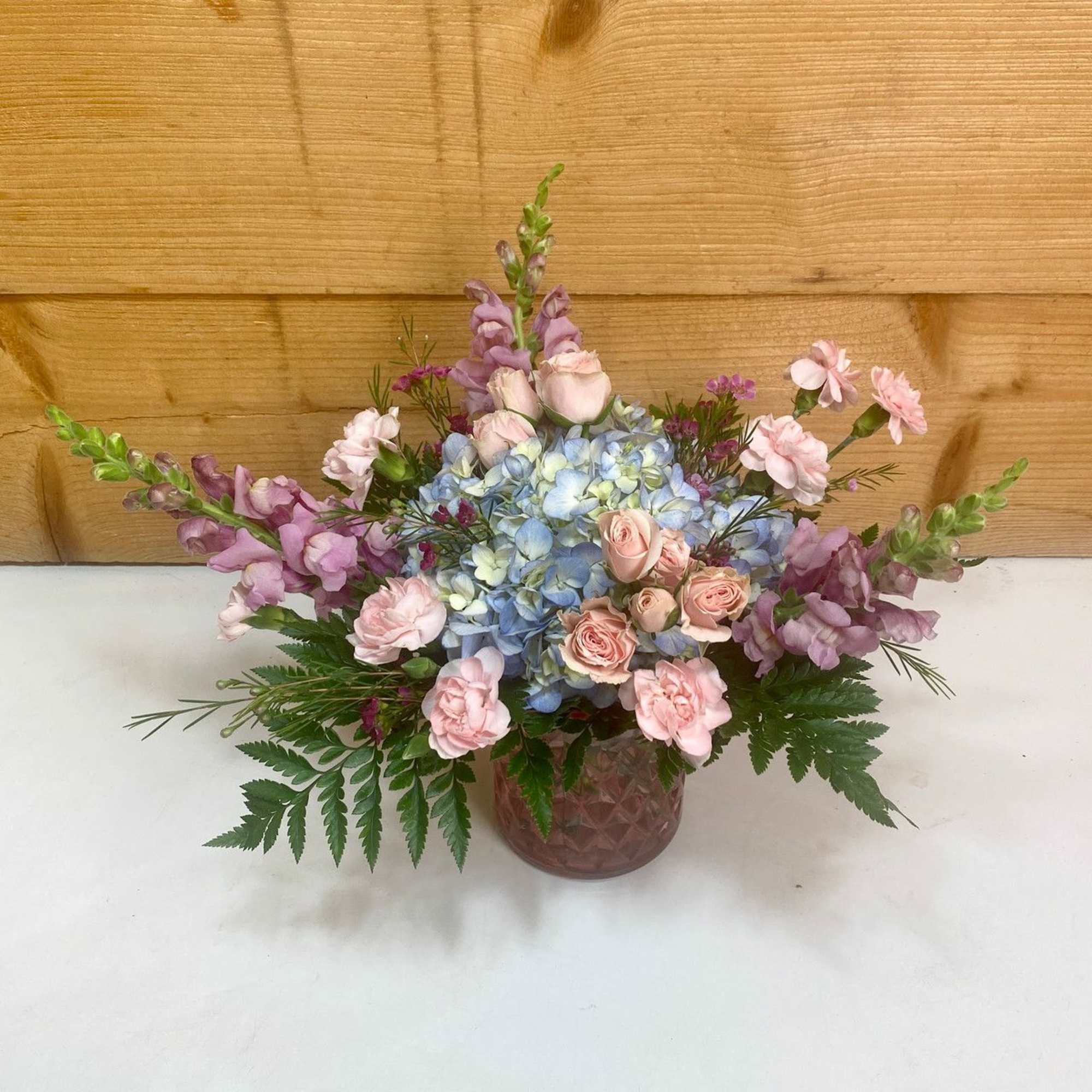 Delicate and graceful, the Lavender Whispers arrangement brings a soft charm to Delicate and graceful, the Lavender Whispers arrangement brings a soft charm to