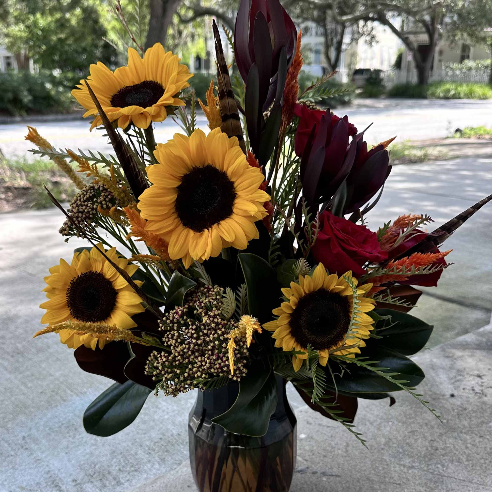 Ignite the season with our Feather & Flame arrangement, inspired by the Ignite the season with our Feather & Flame arrangement, inspired by the