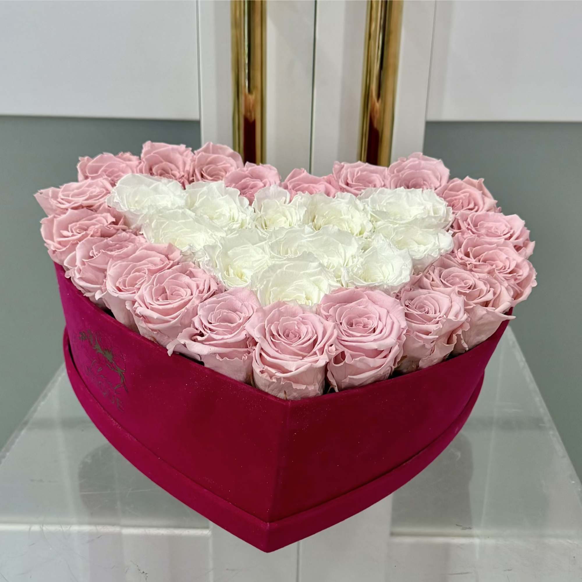 Express your deepest emotions with this breathtaking arrangement of 31 preserved pink