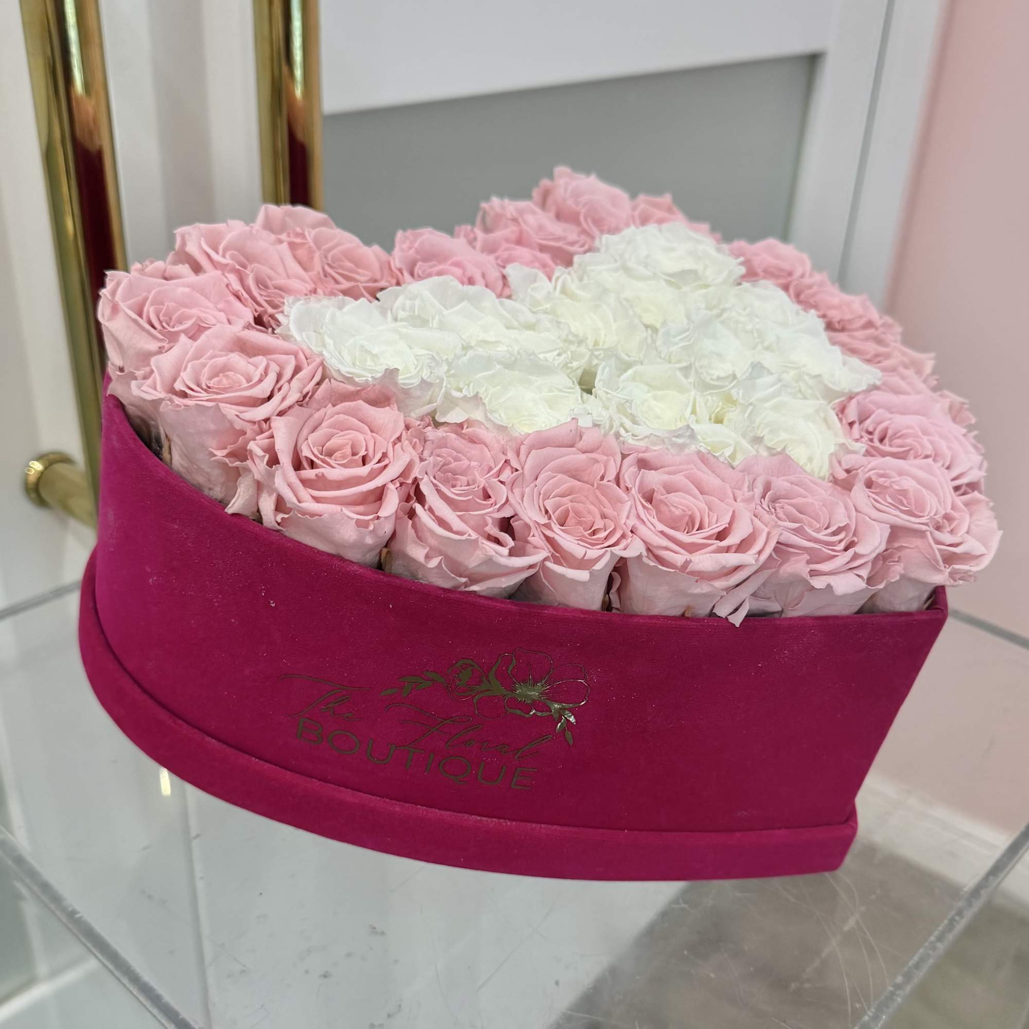 Express your deepest emotions with this breathtaking arrangement of 31 preserved pink