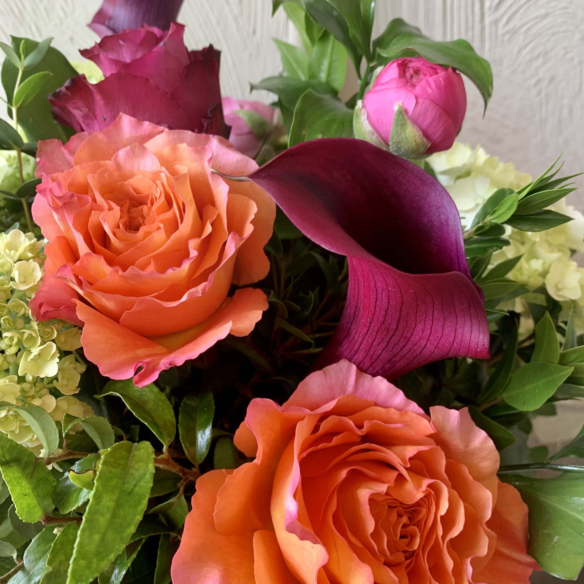 Smiles will be blooming everywhere this attractive garden arrangement goes! Featuring bright