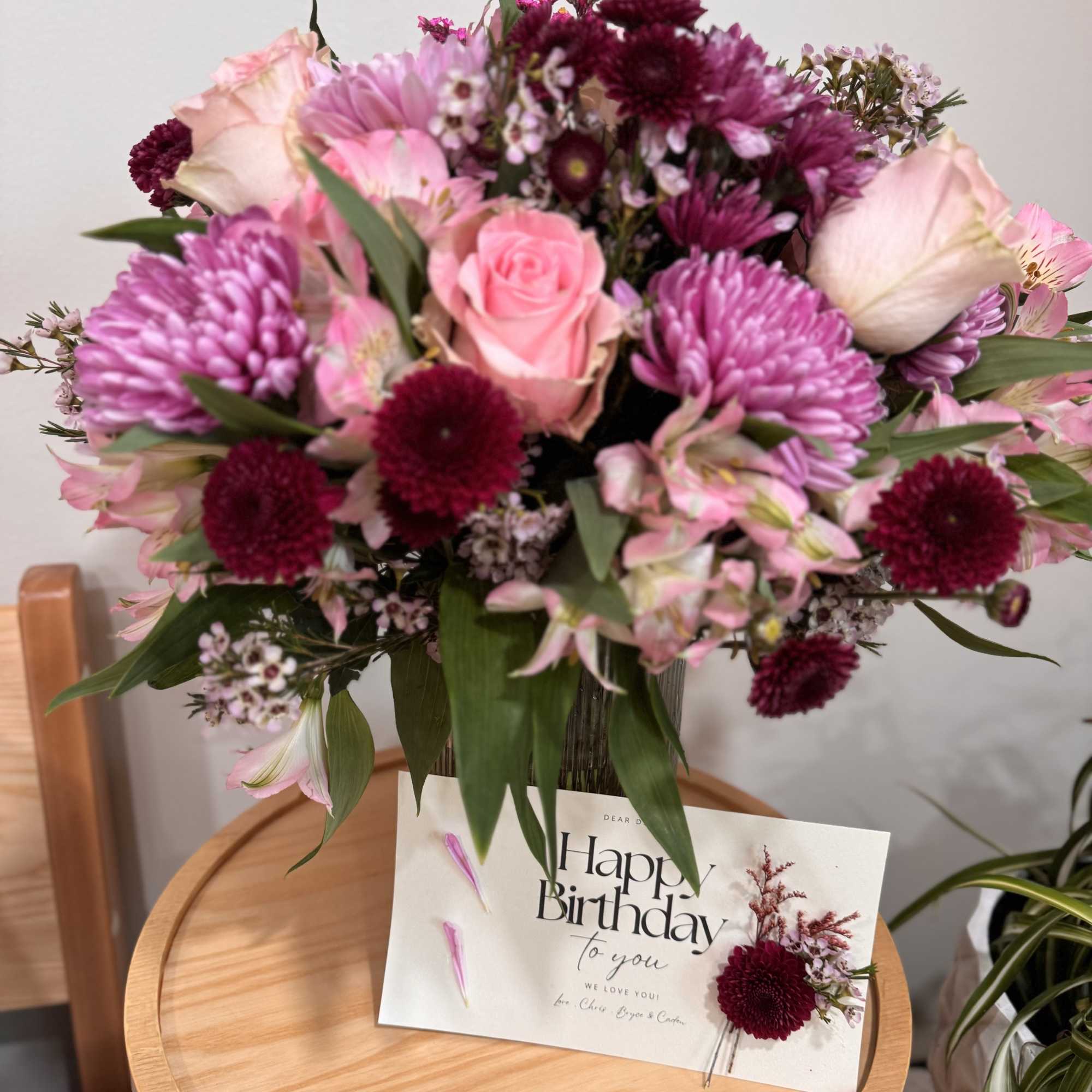 A delectable blend of berry shades make this a beautiful arrangement to A delectable blend of berry shades make this a beautiful arrangement to