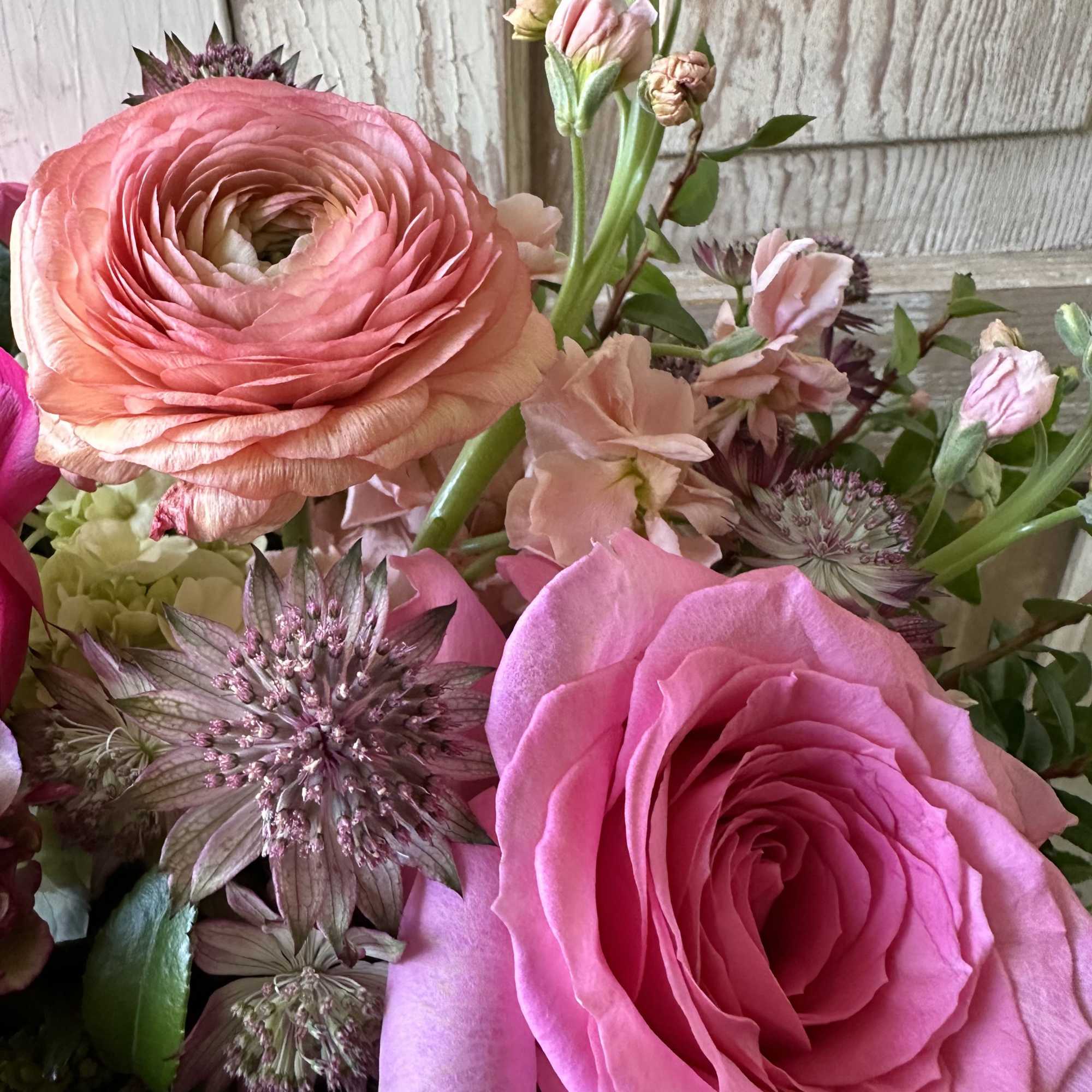 An enchanting bouquet of fresh premium pink flowers. A must have for