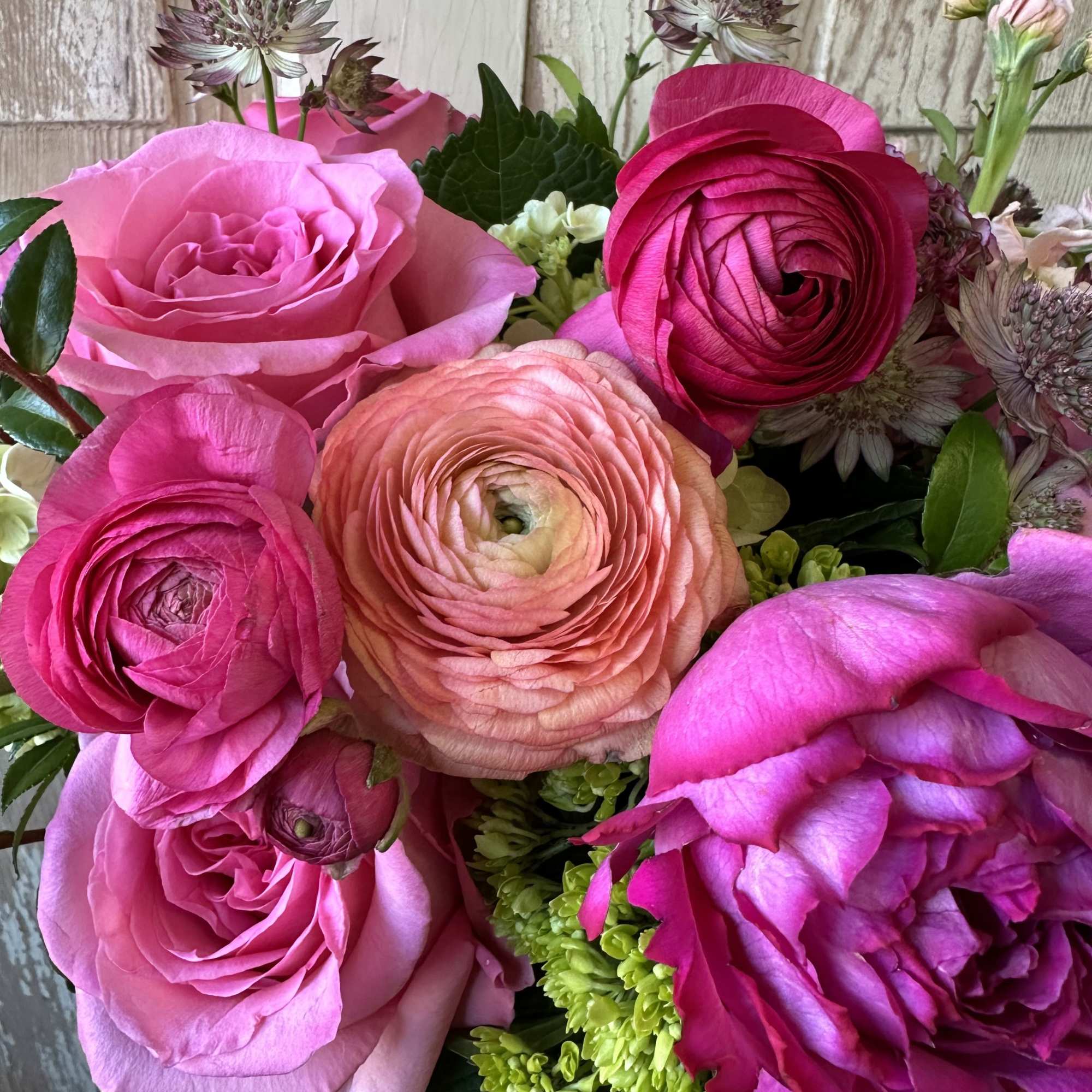 An enchanting bouquet of fresh premium pink flowers. A must have for
