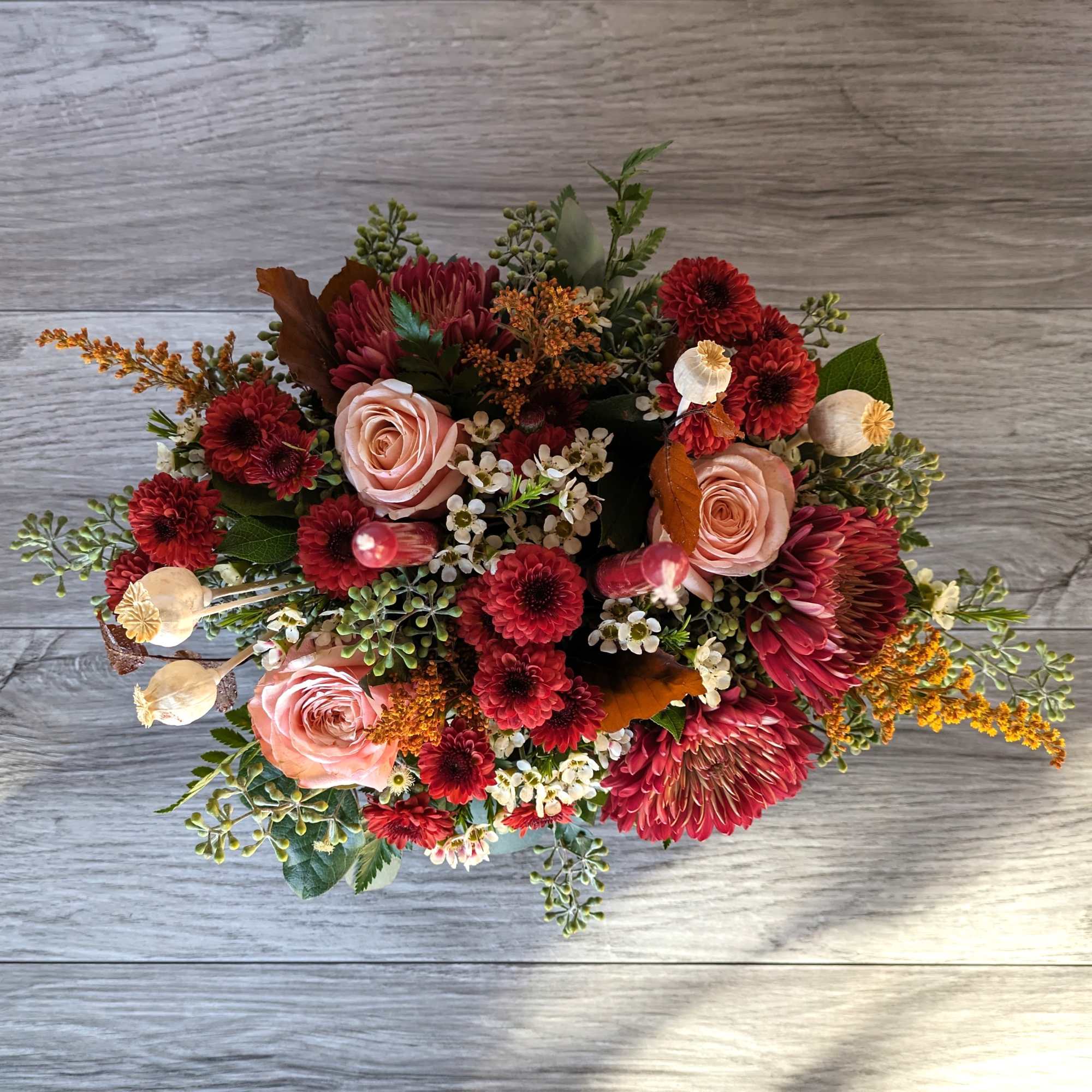 Berry Thankful Centerpiece is a Ladybug Floral exclusive bouquet. Made with roses Berry Thankful Centerpiece is a Ladybug Floral exclusive bouquet. Made with roses