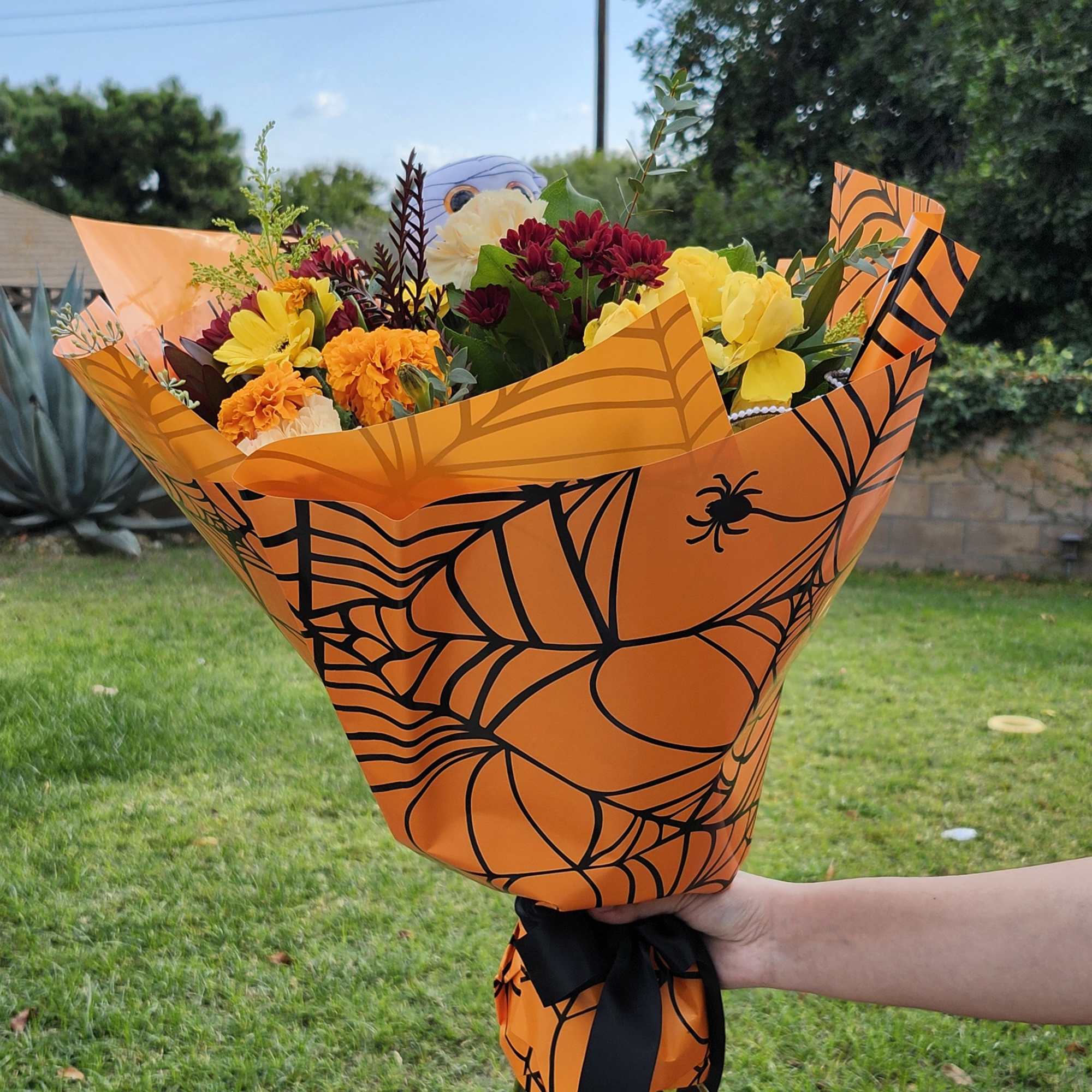 Designer's Choice fall flowers with Halloween theme paper