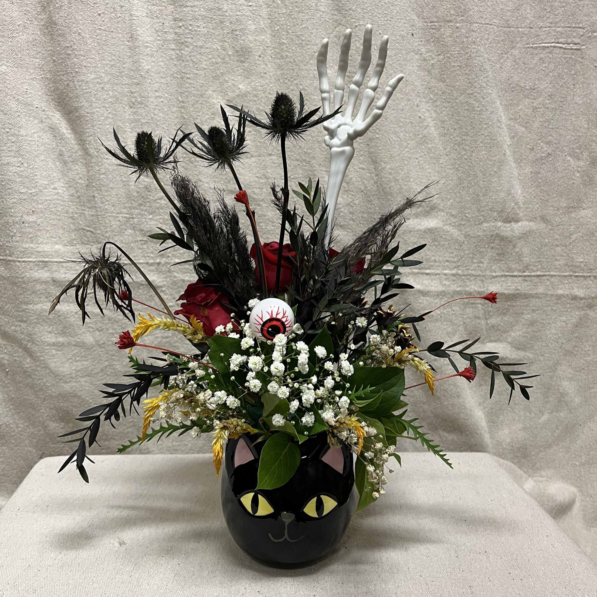 Recipe: Red Roses, Yellow Amaranthus, Black Eryngium, Black Eucalyptus, Babies Breath, and