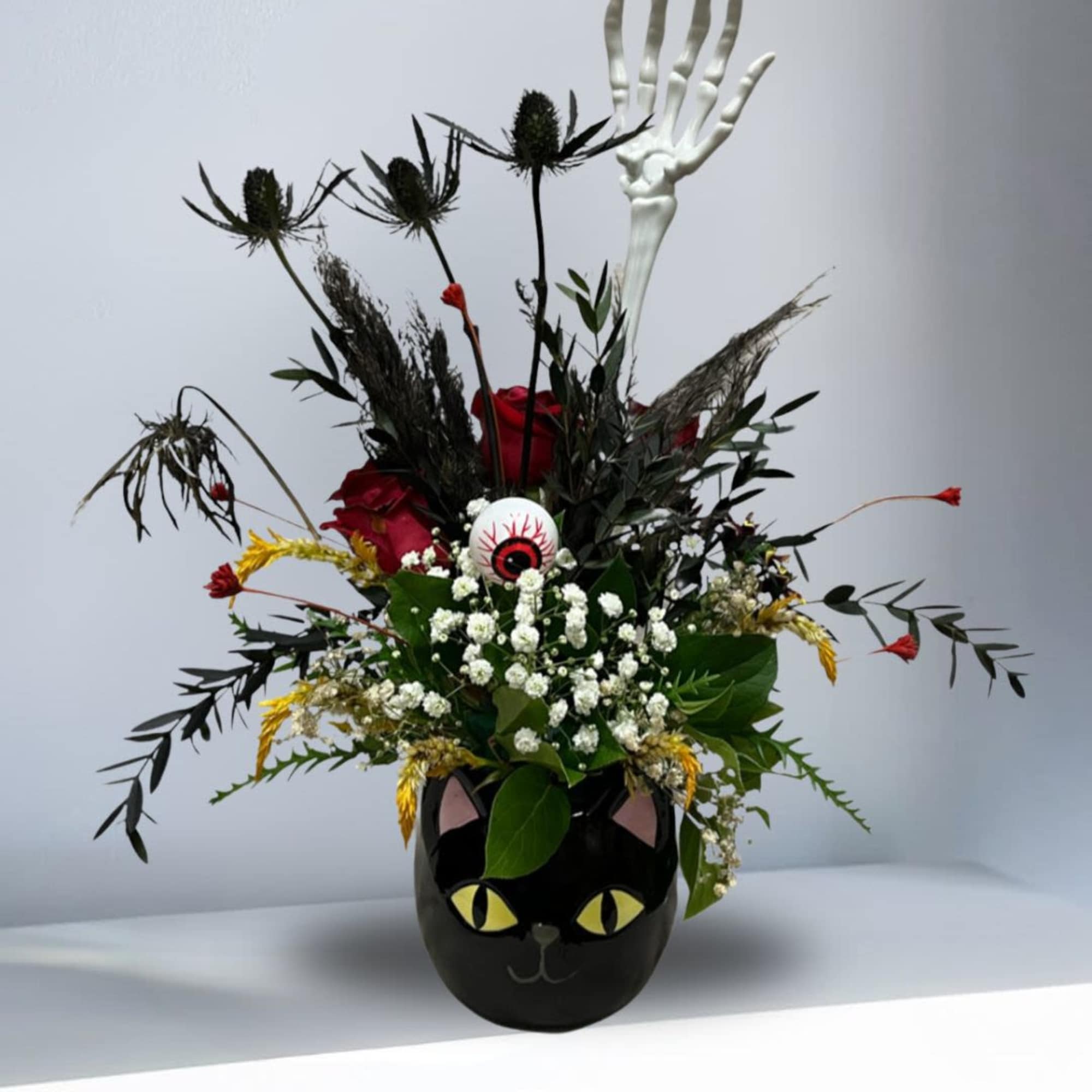 Recipe: Red Roses, Yellow Amaranthus, Black Eryngium, Black Eucalyptus, Babies Breath, and