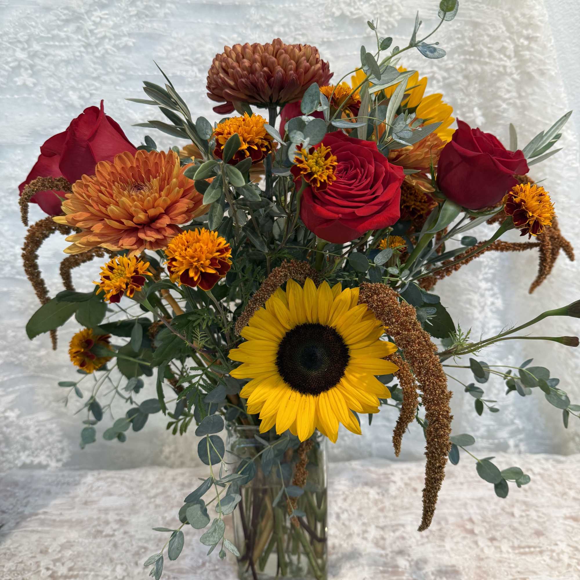 Fall bouquet will be marked with in stock fall flowers

Photos are samples