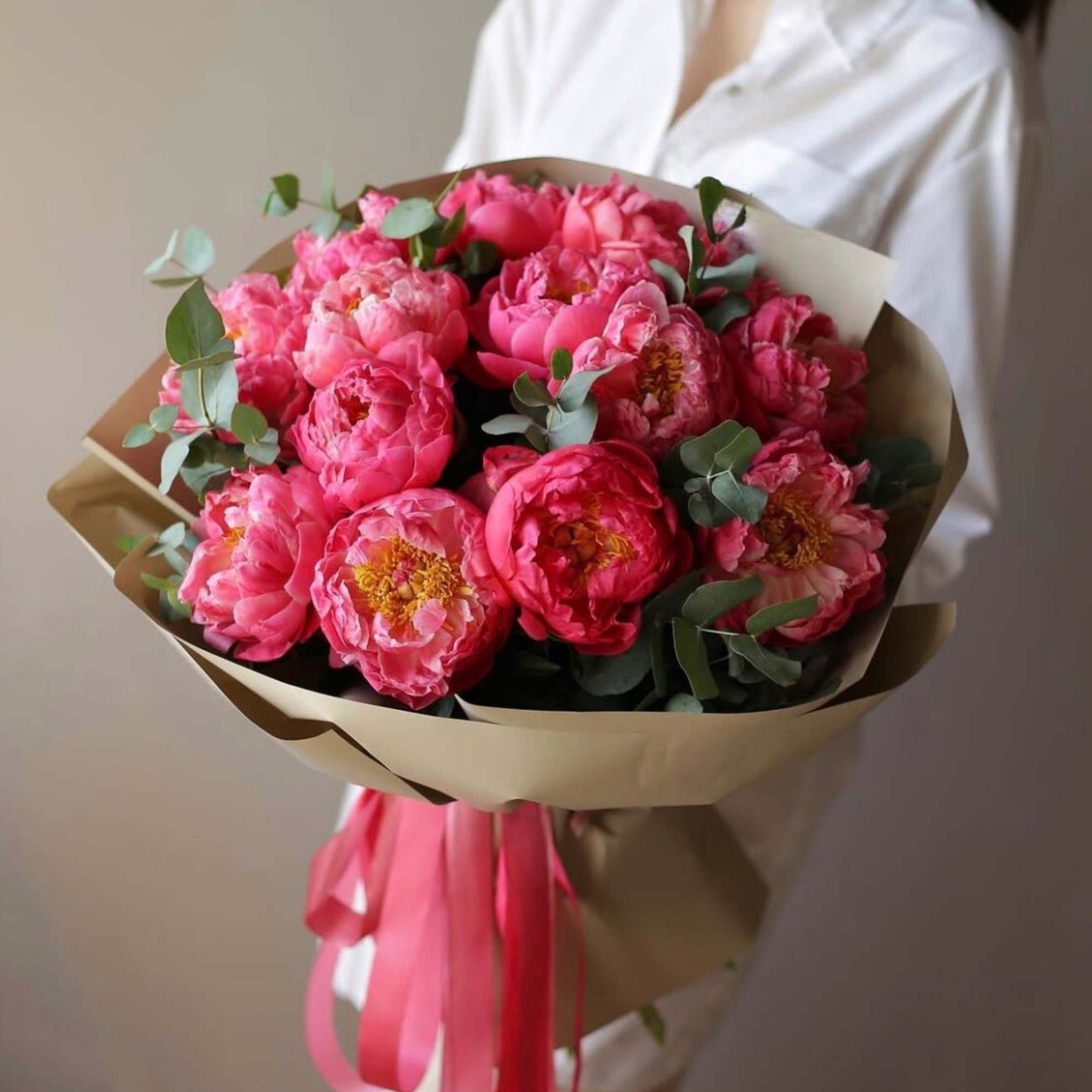 A bouquet of Coral Charm peonies.

Order magical Coral Charm peonies for your