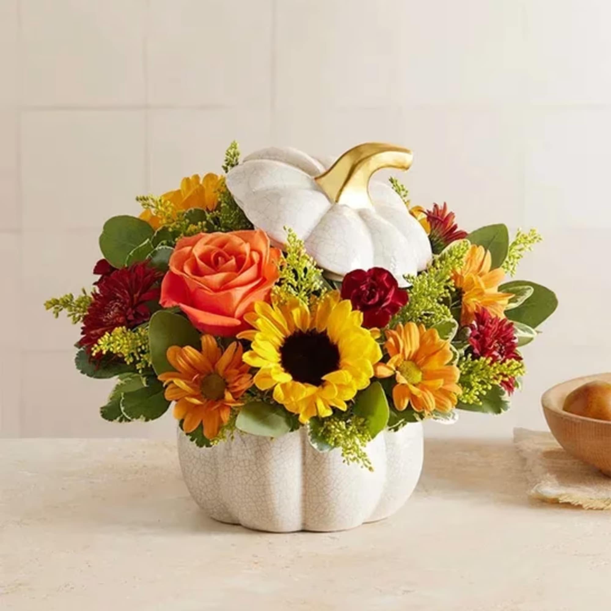EXCLUSIVE A plentiful mix of blooms gives our autumn arrangement an undeniable