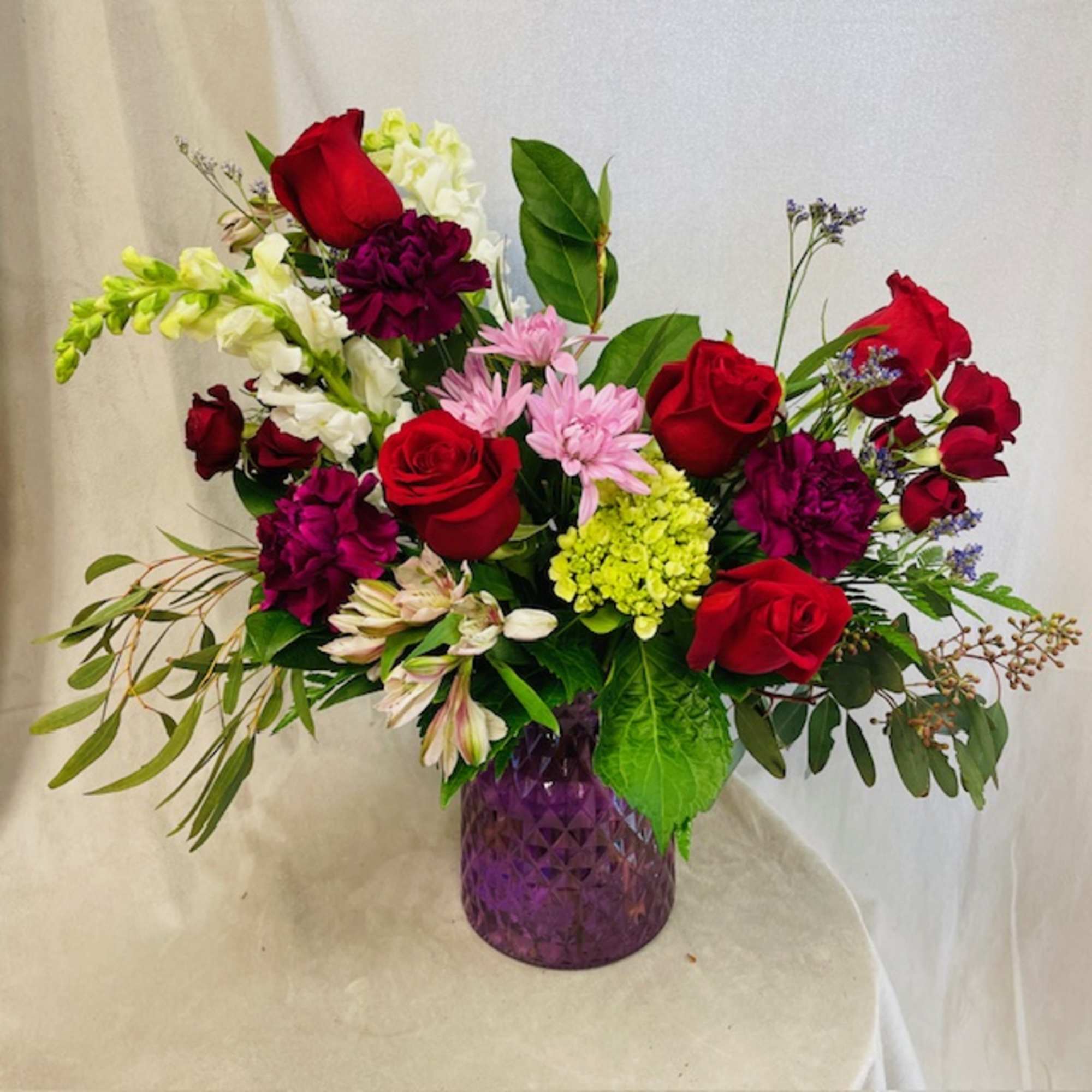 Ignite the flame of romance with the Florist&#039;s Choice Vase Arrangement. Let