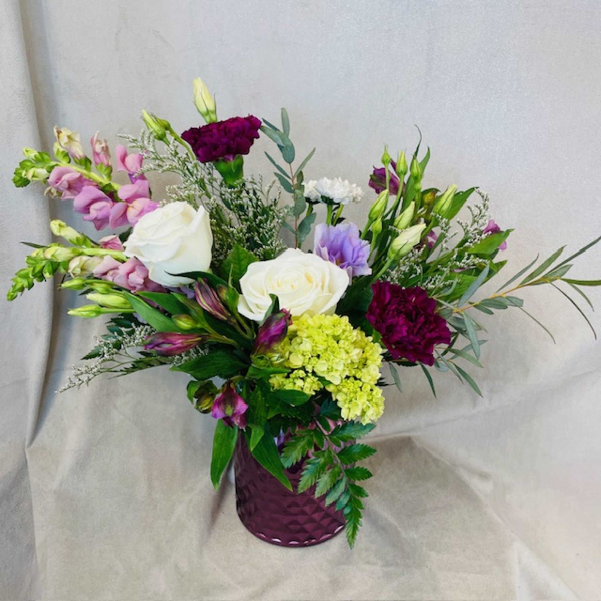 Ignite the flame of romance with the Florist&#039;s Choice Vase Arrangement. Let