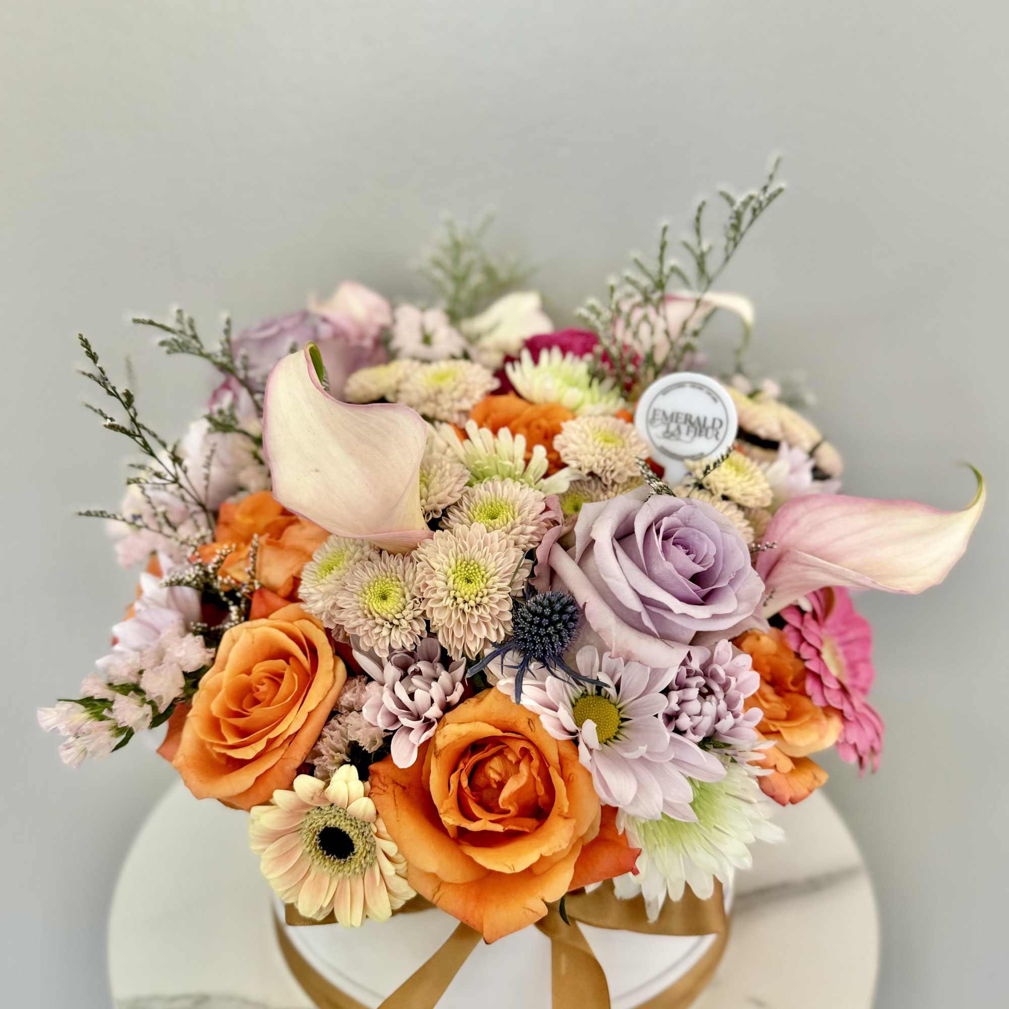 A beautiful mix of colors and flowers specially selected by the Florist.
