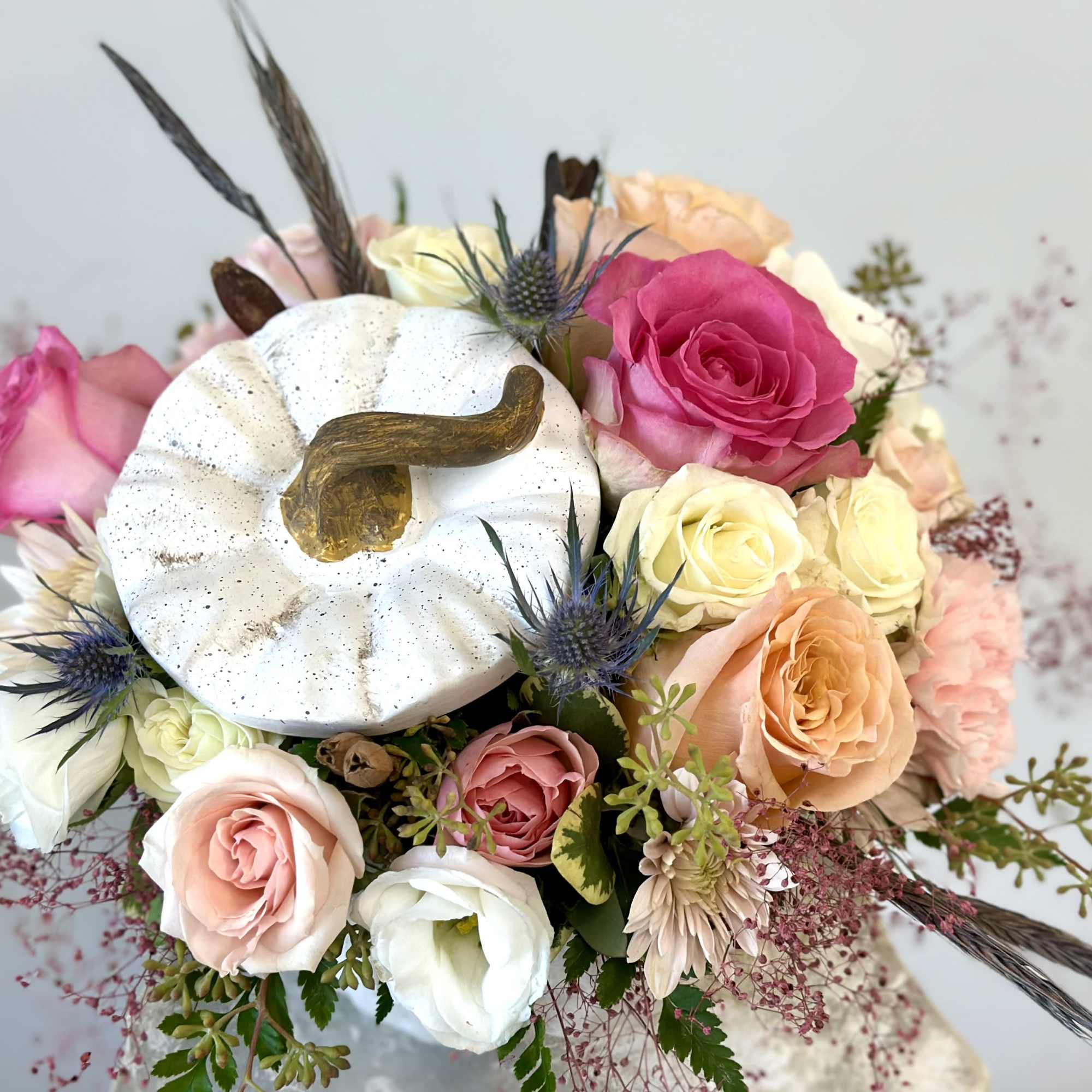 Transform your space with the exquisite White Pumpkin Delight by Westford Florist