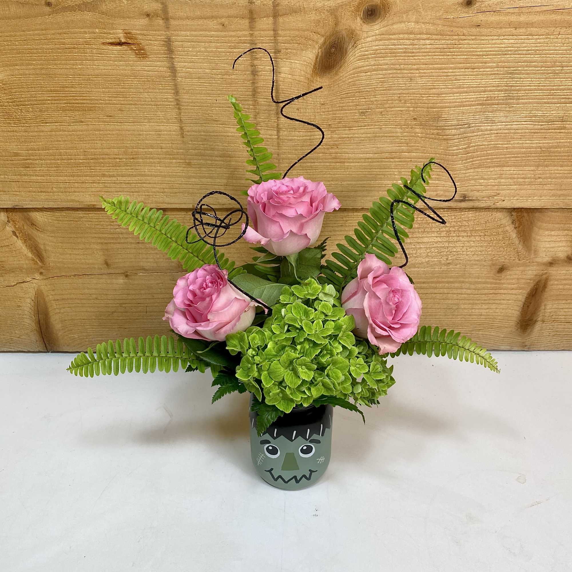 A playful nod to the classic monster, this Frankenstein’s Monster mason jar A playful nod to the classic monster, this Frankenstein’s Monster mason jar