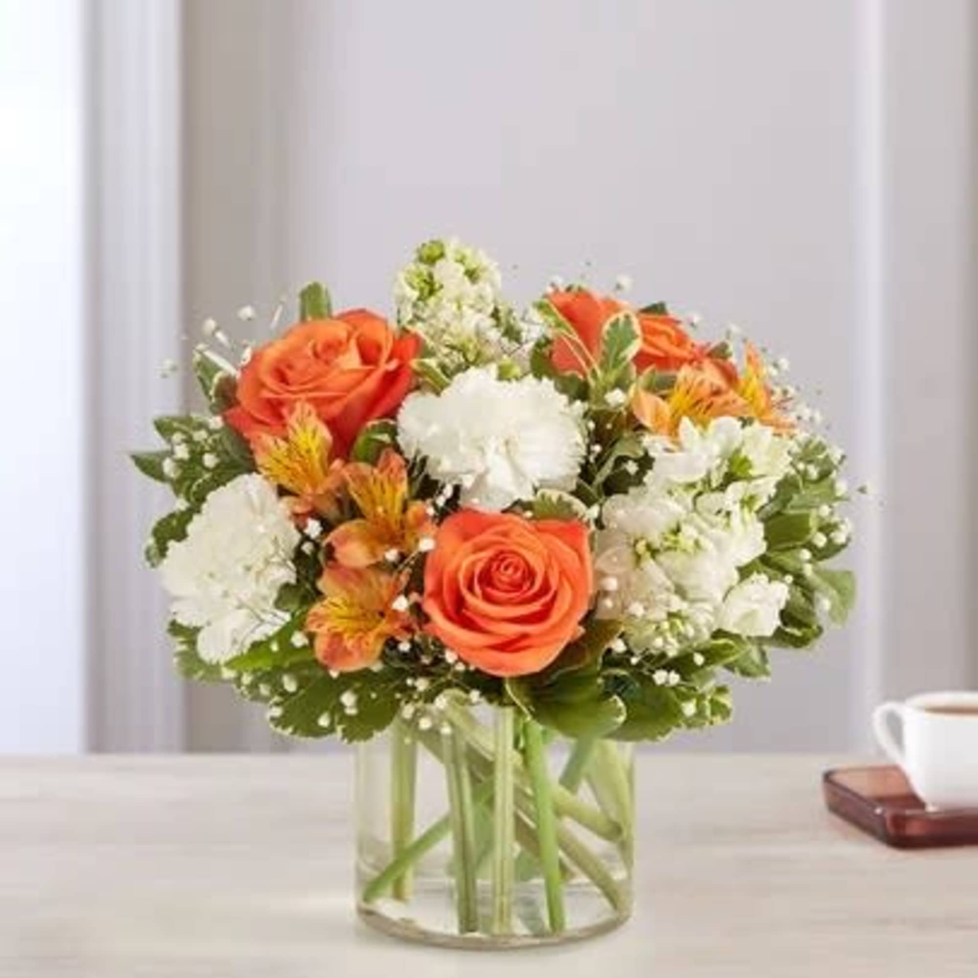The sweet citrus shades in our charming bouquet bring your sentiments to