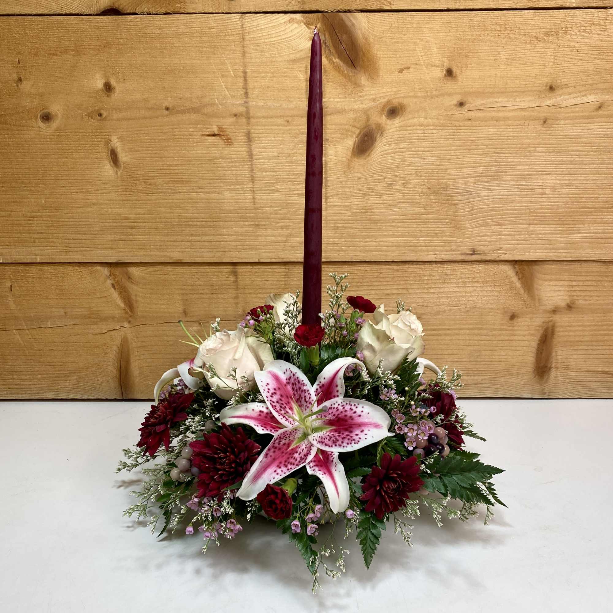 Merlot Memories is the perfect floral arrangement for your Thanksgiving festivities, featuring