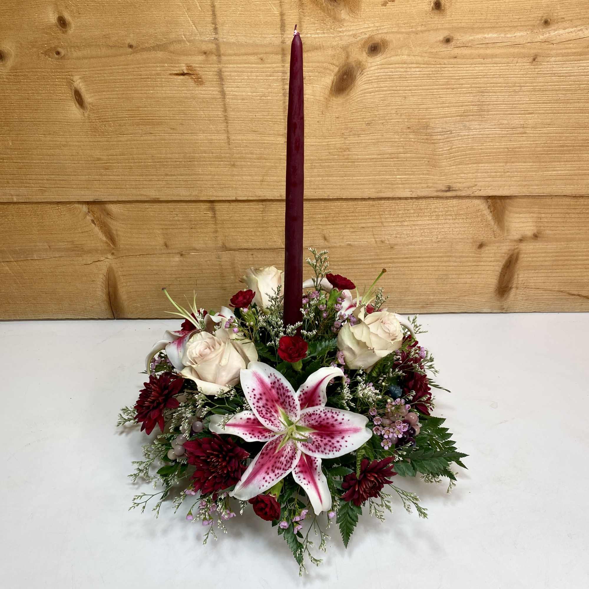 Merlot Memories is the perfect floral arrangement for your Thanksgiving festivities, featuring