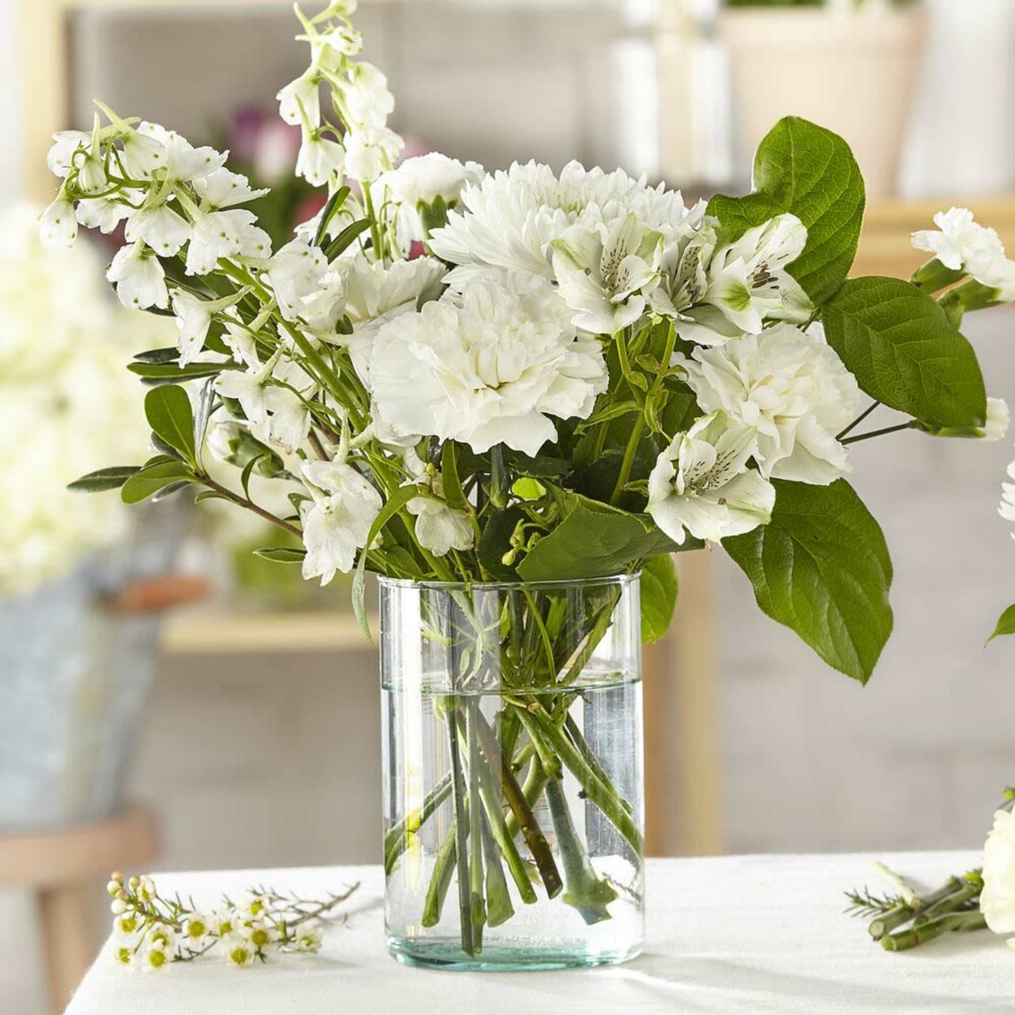 Elevate any occasion with the timeless elegance of the Classic Ivory Flower