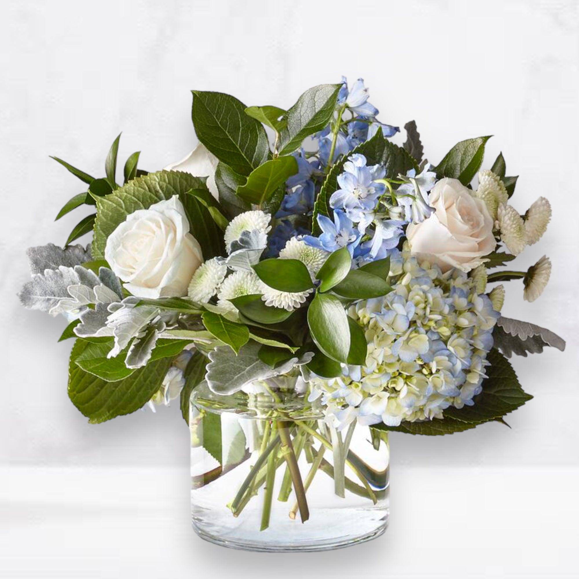 Let this uplifting arrangement be reminders of the clear skies ahead. Capturing