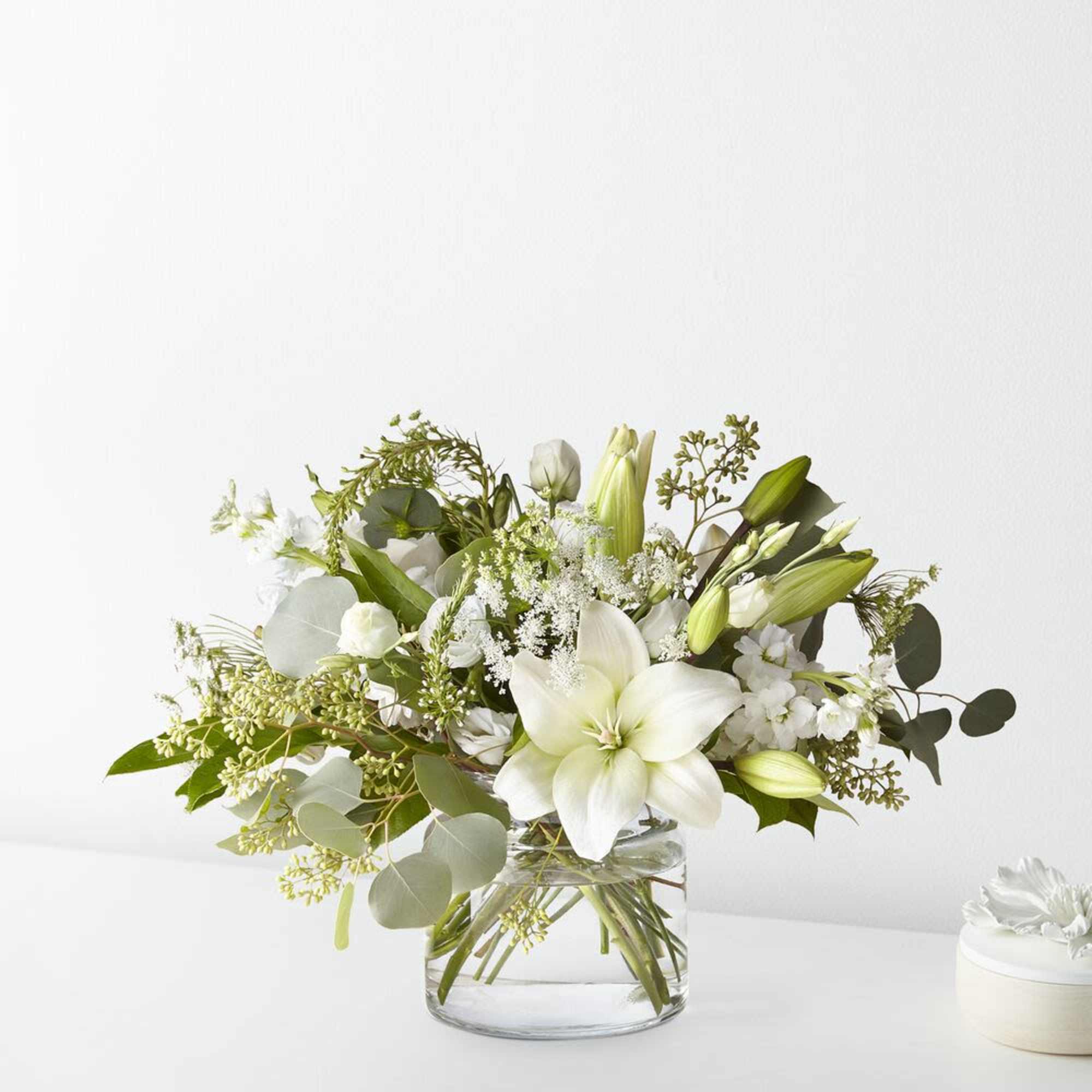Bring sophistication and grace to any space with the Alluring Elegance Bouquet