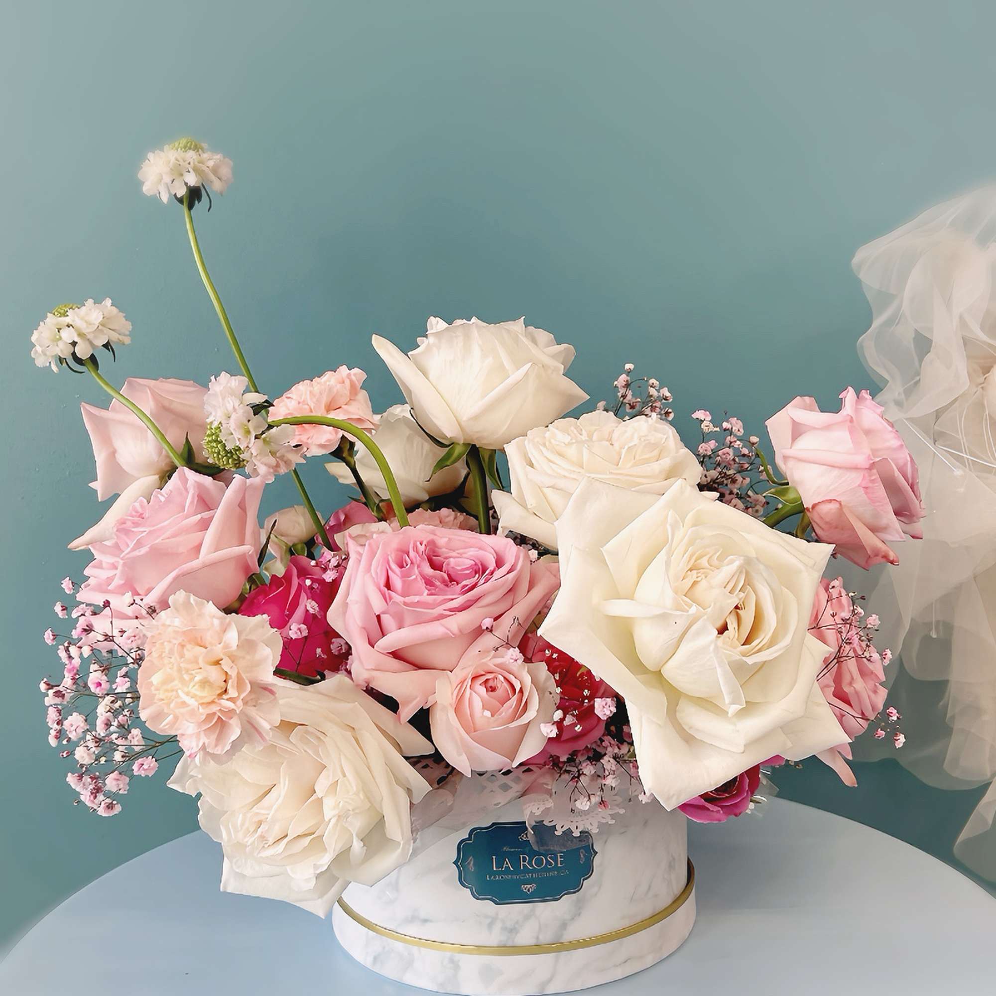 Celebrate the beauty of spring with our premium floral arrangement, featuring a