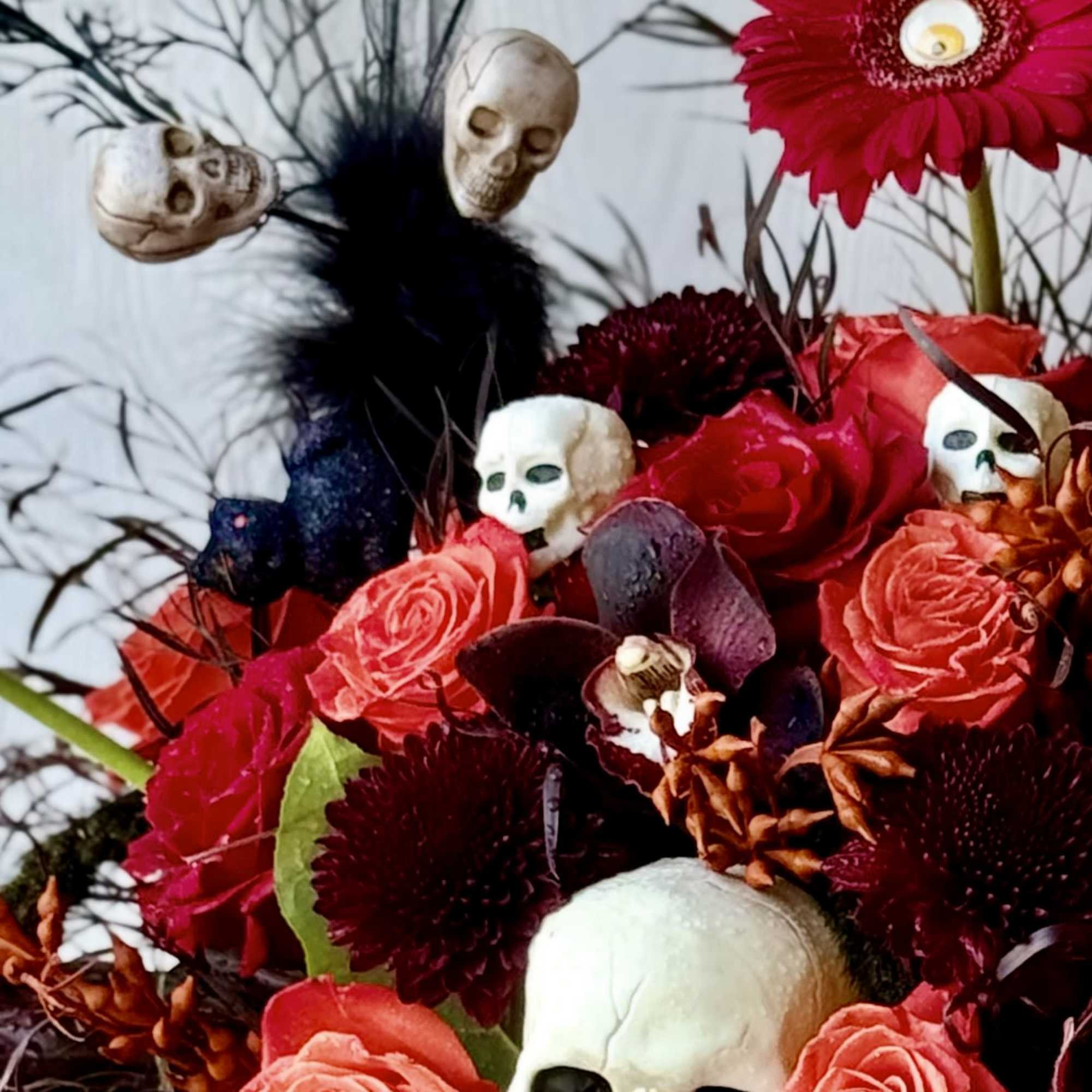 Make a bold statement this Halloween with our Dark Enchantment floral arrangement