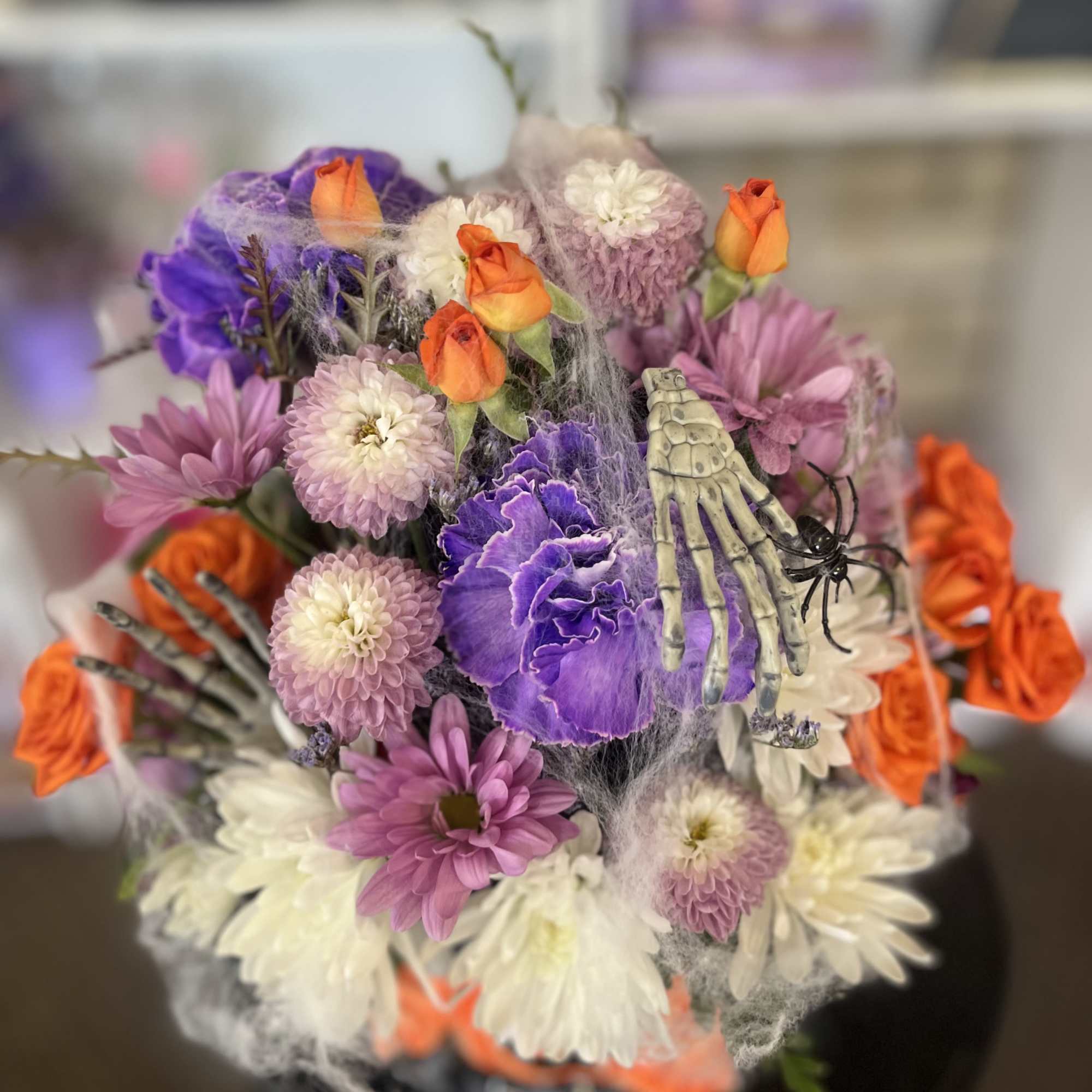 fresh flowers in pumpkin  coffee mug 