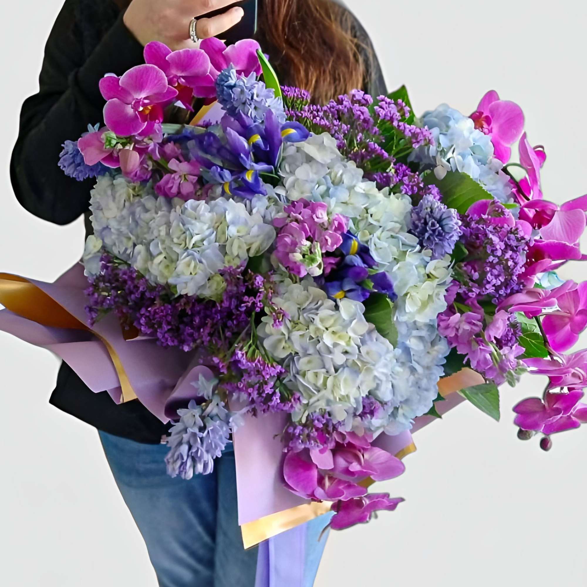 Roses orchids hydrangeas and so much more arranged as a presentation style