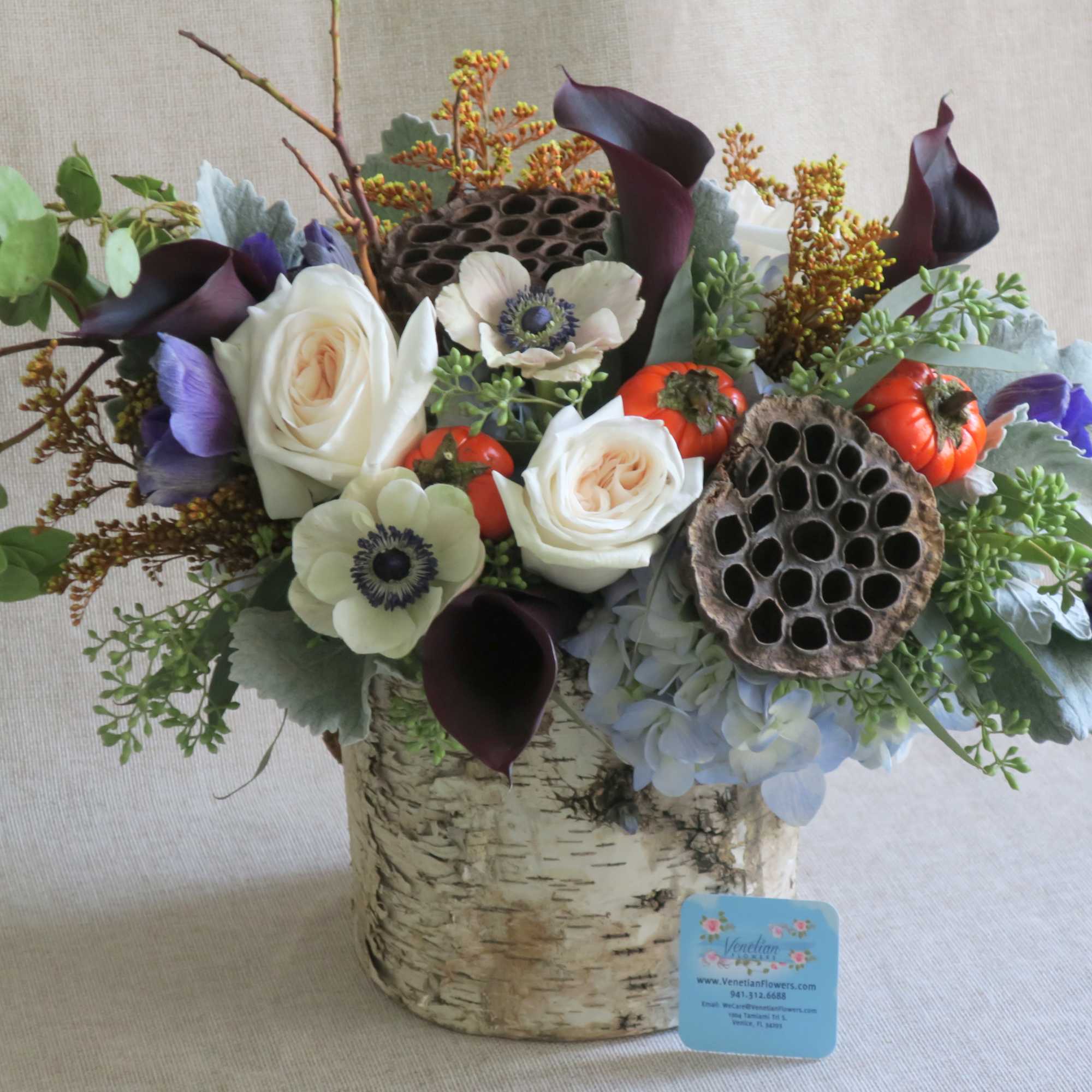 Bring in some seasonal top pick blooms with gorgeous plum calla lilies