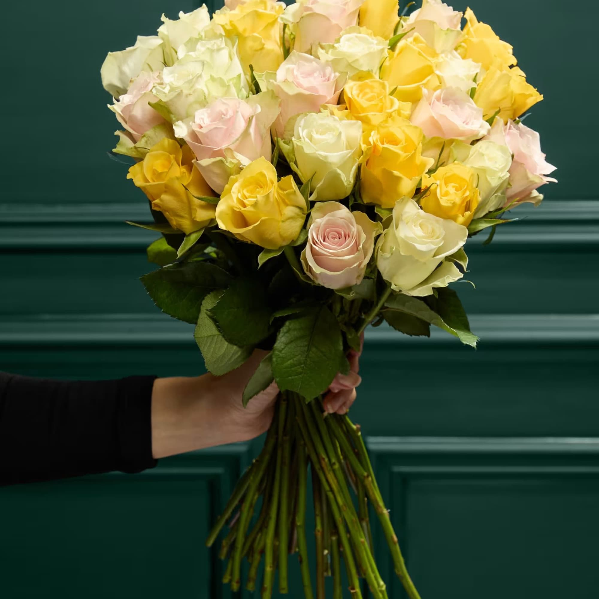 Celebrate the timeless beauty of roses with this stunning bouquet featuring 25