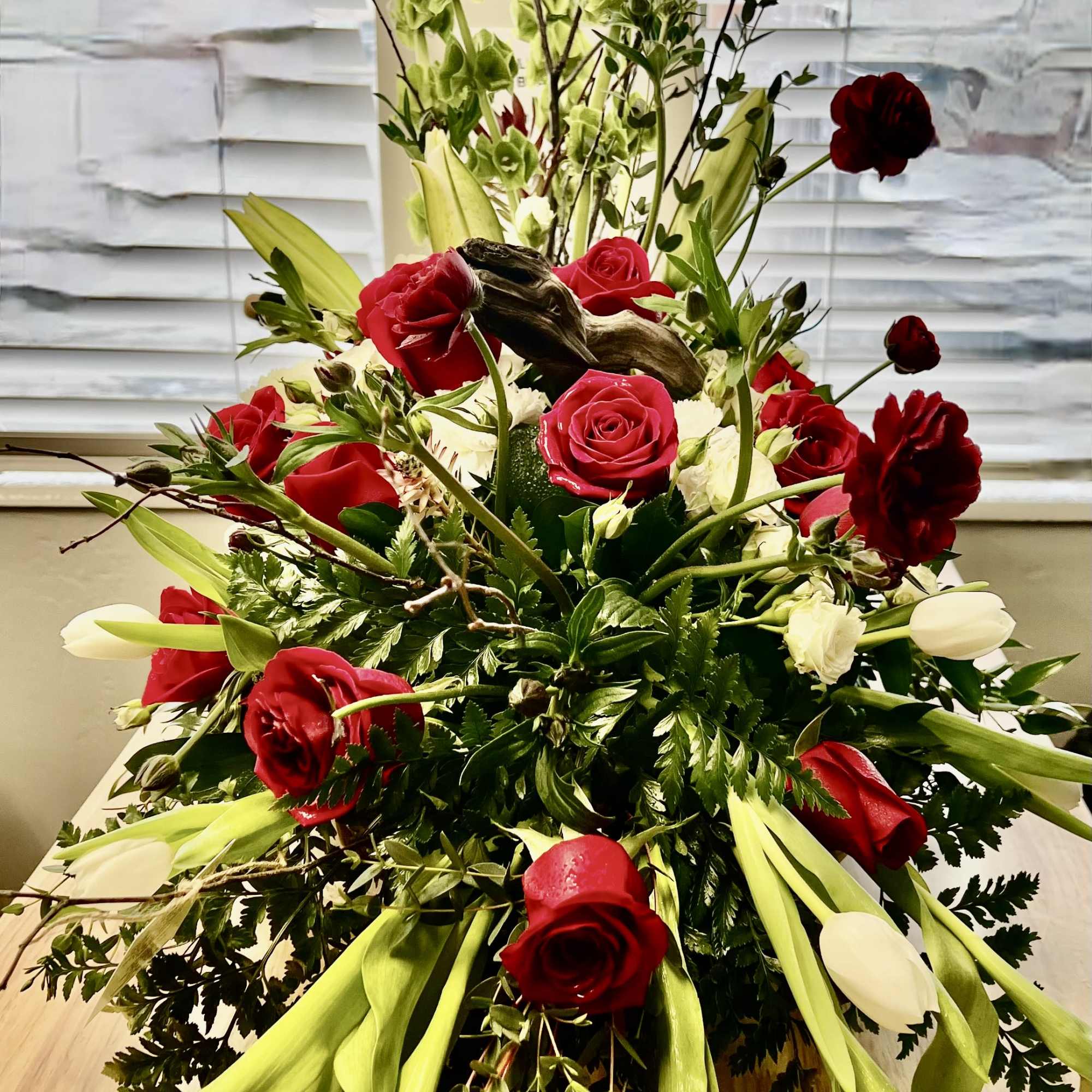 Gorgeous hydrangea, Red Roses, Safari Sunset, Tulips, Ranunculus, Birch branches, Belles of