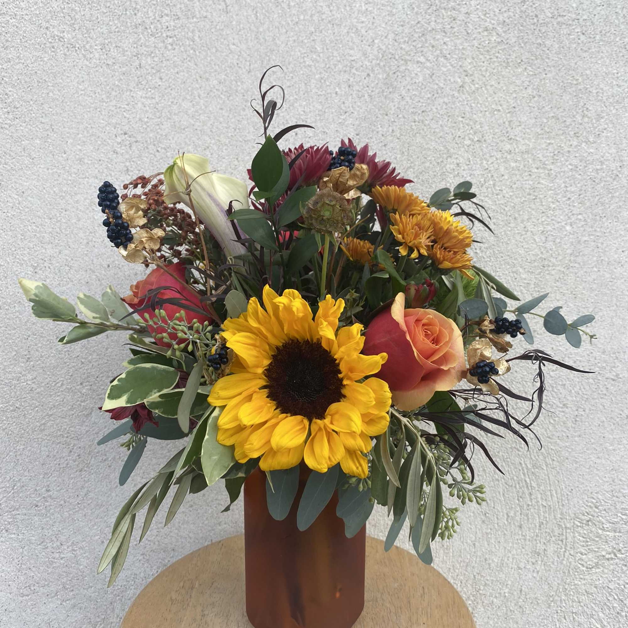A designer&#039;s choice arrangement of flowers in a similar look and feel