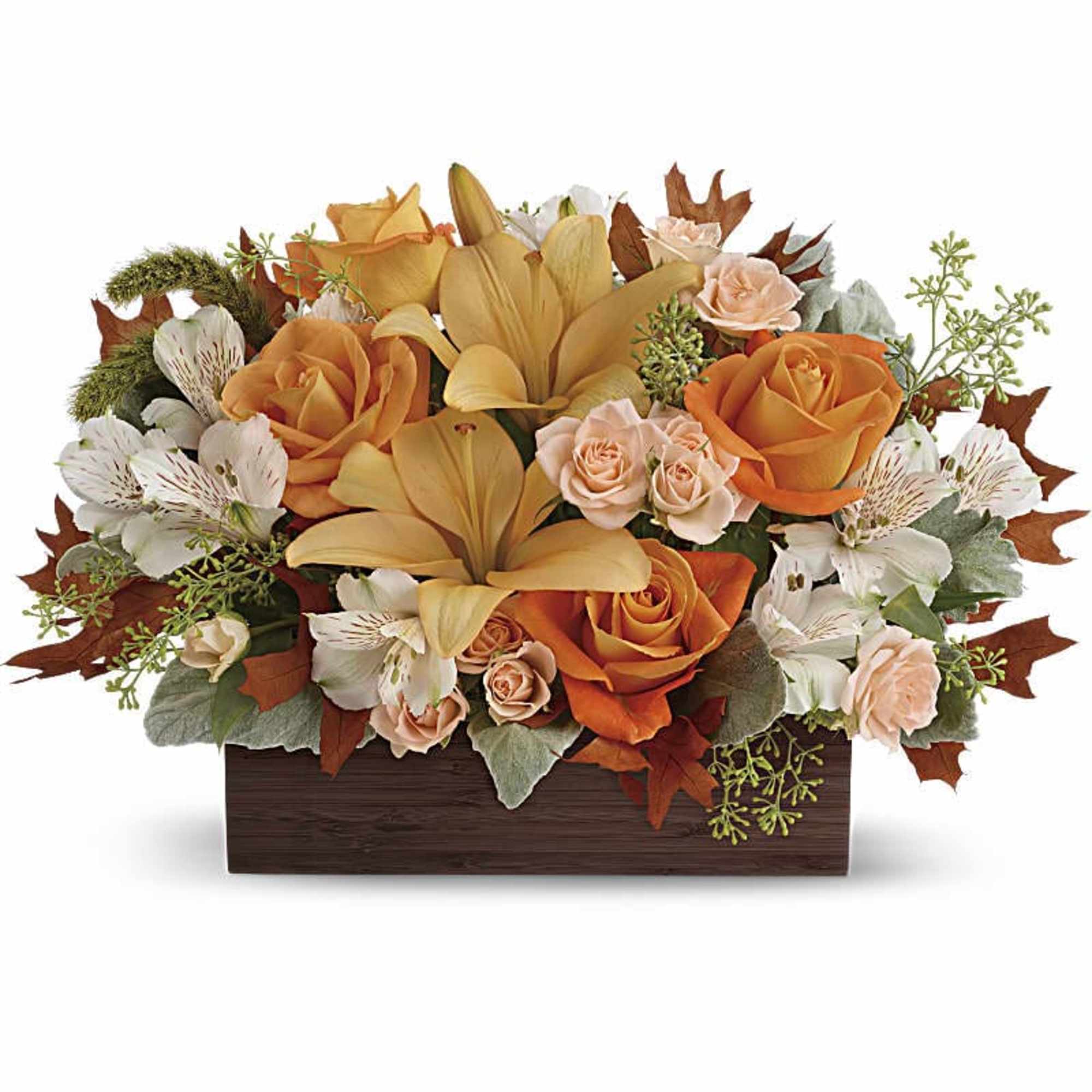Simply chic and overflowing with fall blooms! This gorgeous arrangement is sure
